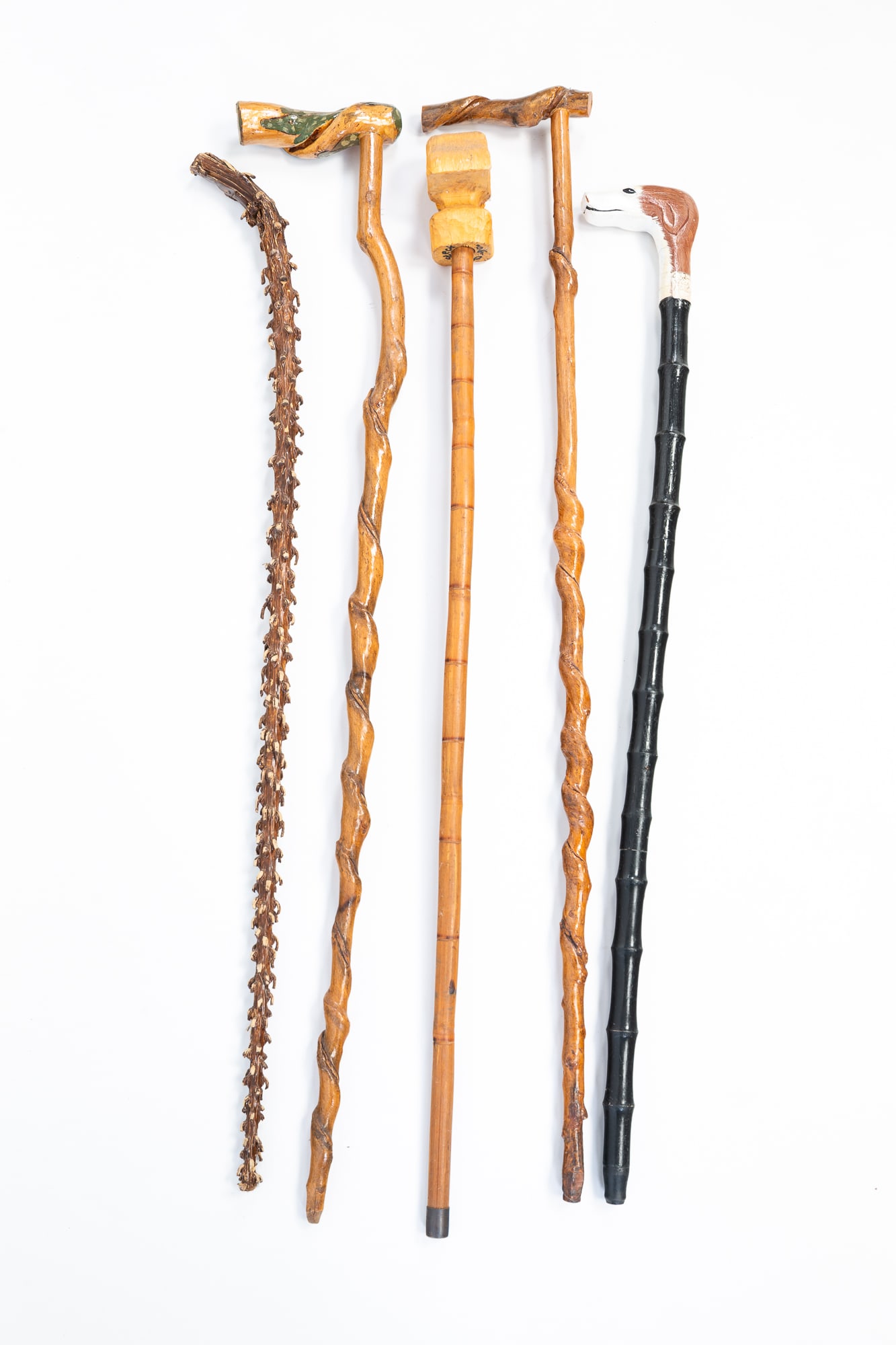 GROUP OF FIVE FOLK ART CANES OR WALKING STICKS. Largest, 38"l. (1 of 7)