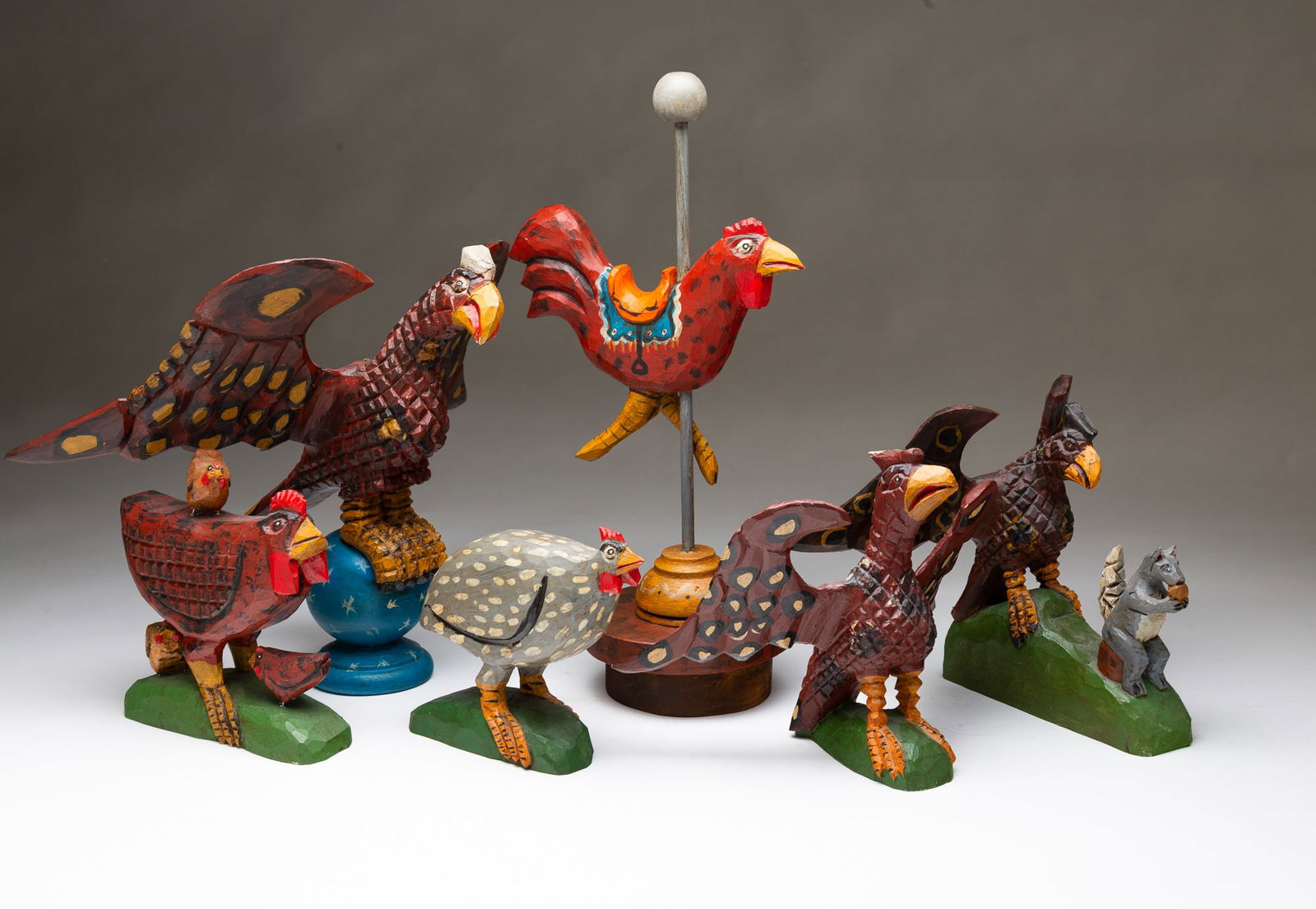 SIX DANIEL AND BARBARA STRAWSER (PENNSYLVANIA) FOLK ART BIRD CARVINGS. Largest, 11"h. 14.5"w. (1 of 8)