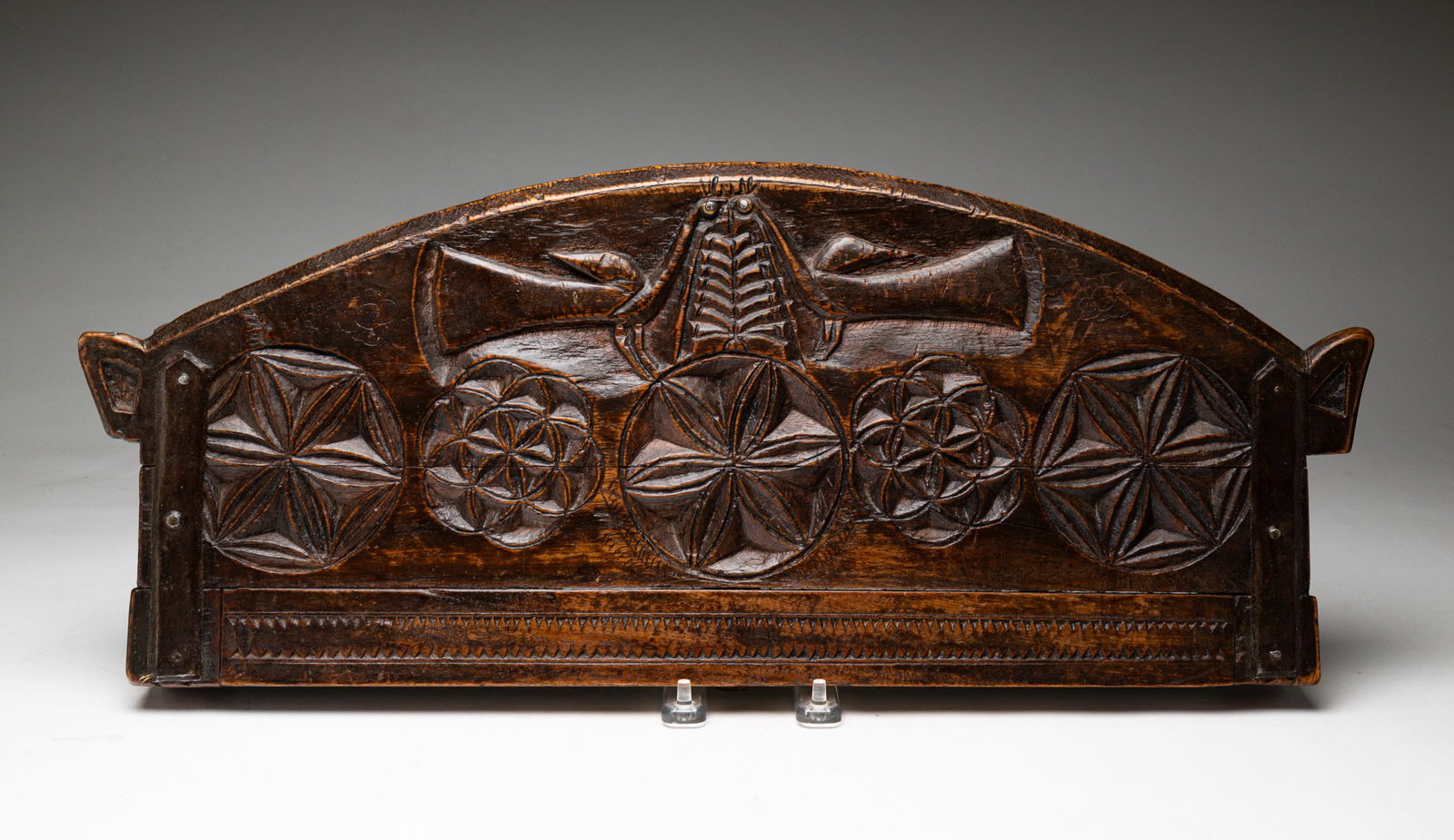 EUROPEAN CARVED CRADLE HEADBOARD. 8.75"h. 21.5"w. (1 of 3)