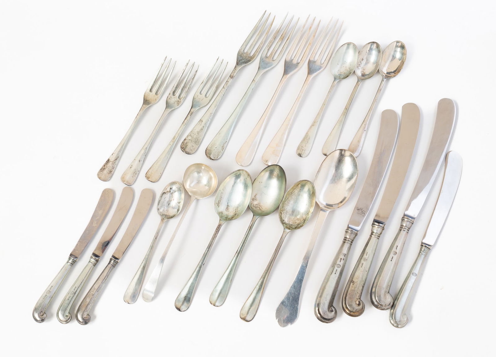 GROUP OF STIEFF COLONIAL WILLIAMSBURG STERLING SILVER FLATWARE.: American, 20th Century. Three sizes of hollow handled pistol grip knives, three soup spoons, four teaspoons, three salad forks, four dinner forks, a serving spoon, and sauce ladle. Approximately 25ozt