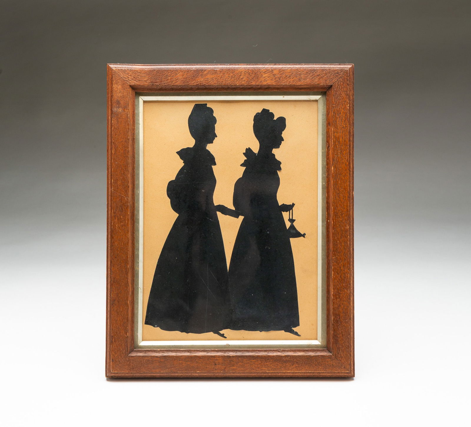 TWO AMERICAN SCHOOL CUT PAPER FULL-LENGTH SILHOUETTES OF LADIES. Frame, 11"h. 8.75"w. (1 of 3)