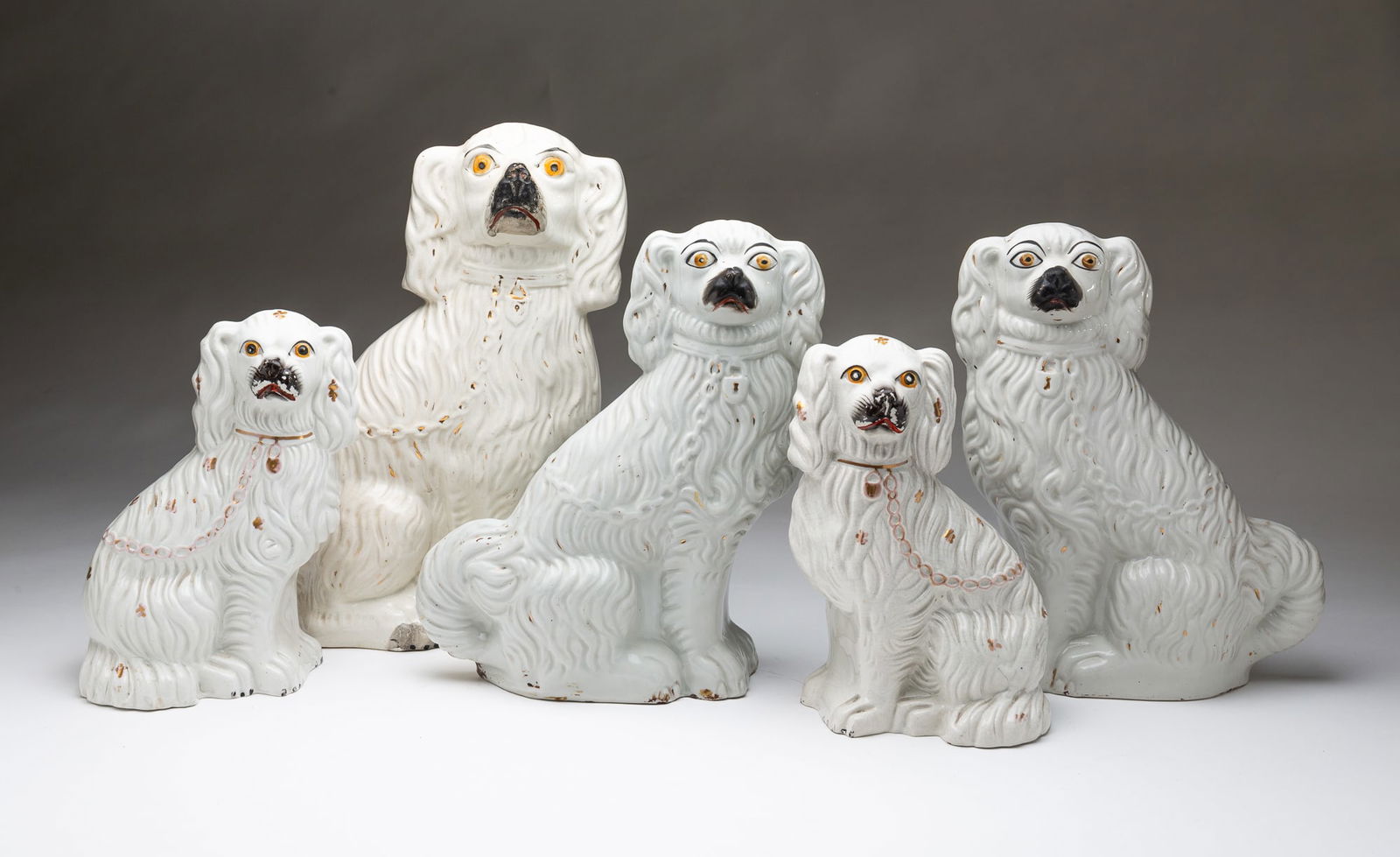 FIVE STAFFORDSHIRE SEATED SPANIELS. Single, 13.5"h. (1 of 5)