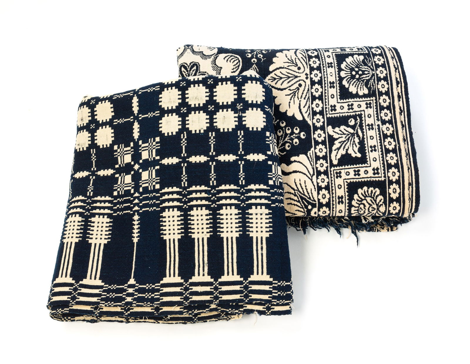 TWO AMERICAN SUMMER-WINTER JACQUARD COVERLETS IN BLUE AND WHITE. Floral, 72"w. 88"l. Geometric, (1 of 8)