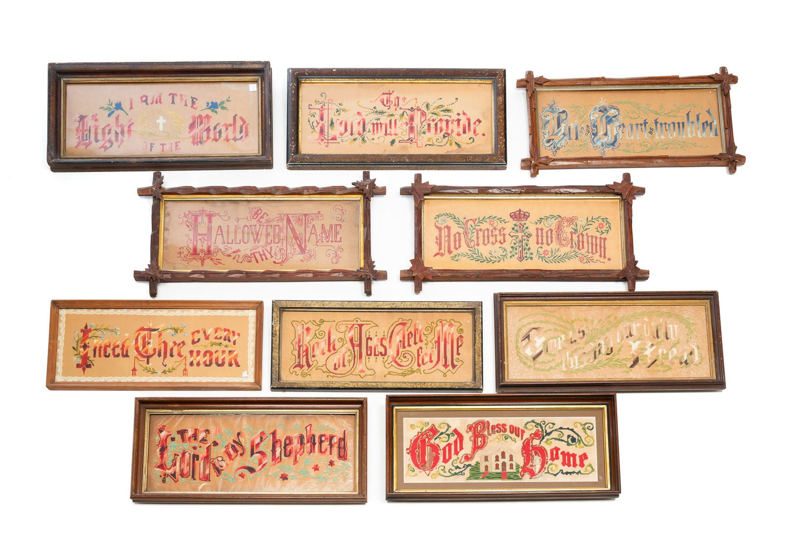 TEN AMERICAN BERLIN SAMPLERS. Largest, 23"h. 10.75"w.: Late 19th Century. Colored thread on cards. All with religious phrases, "The Lord will Provide", "I need Thee every Hour", "God Bless Our Home". "The Lord my Shepherd", and "Rock of Ages Cleft for me"