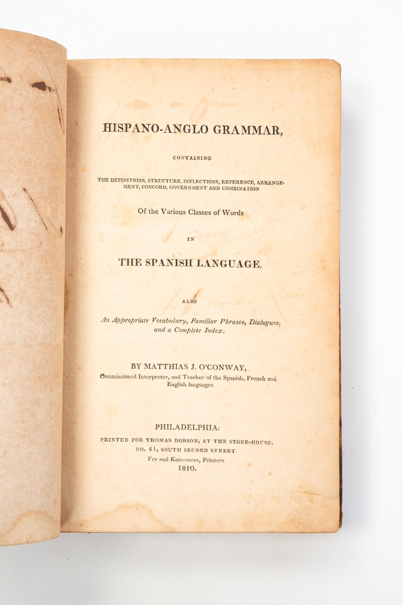 1810 HISPANO-ANGLO GRAMMAR BY MATTHAIS J. O'CONWAY. 8.75"h. 5.5"w.: Philadelphia, Fry and Kammerer, 1810. Leather-bound book with gilt lettering at spine.SHIPPING: All purchases from Amelia Jeffers, Auctioneers & Appraisers may be picked up by you or your designated a
