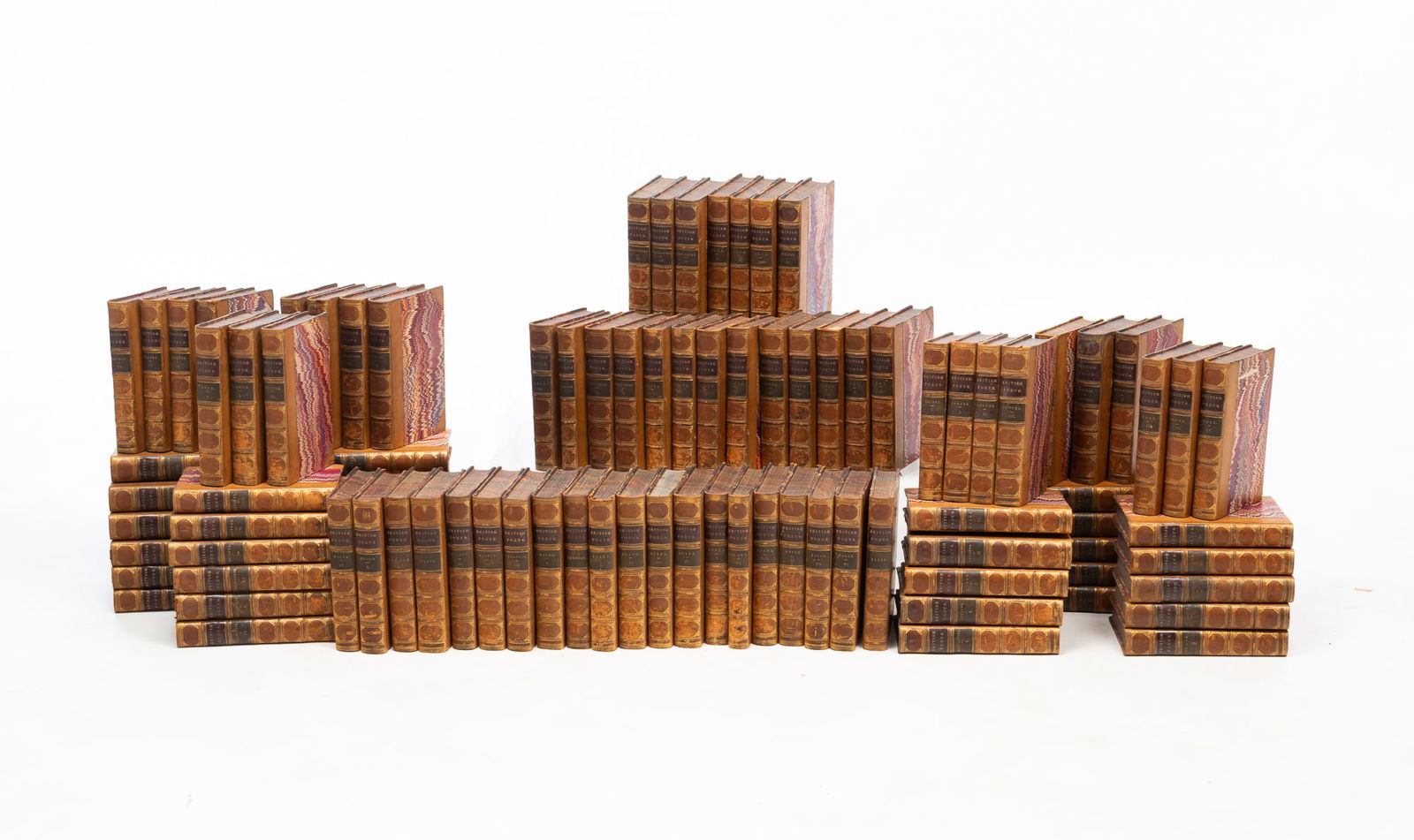 PARTIAL SET OF THE BRITISH POETS SERIES. Overall, 19"h. 16"w. 20"d. One book, 6.75"h. 4.75"w.: Boston, Little, Brown and Company, edited by Francis James Brown. Third quarter 19th Century. Leather-bound books with marbled covers and page ends and with gilt-lettered spines.SHIPPING: All purchase