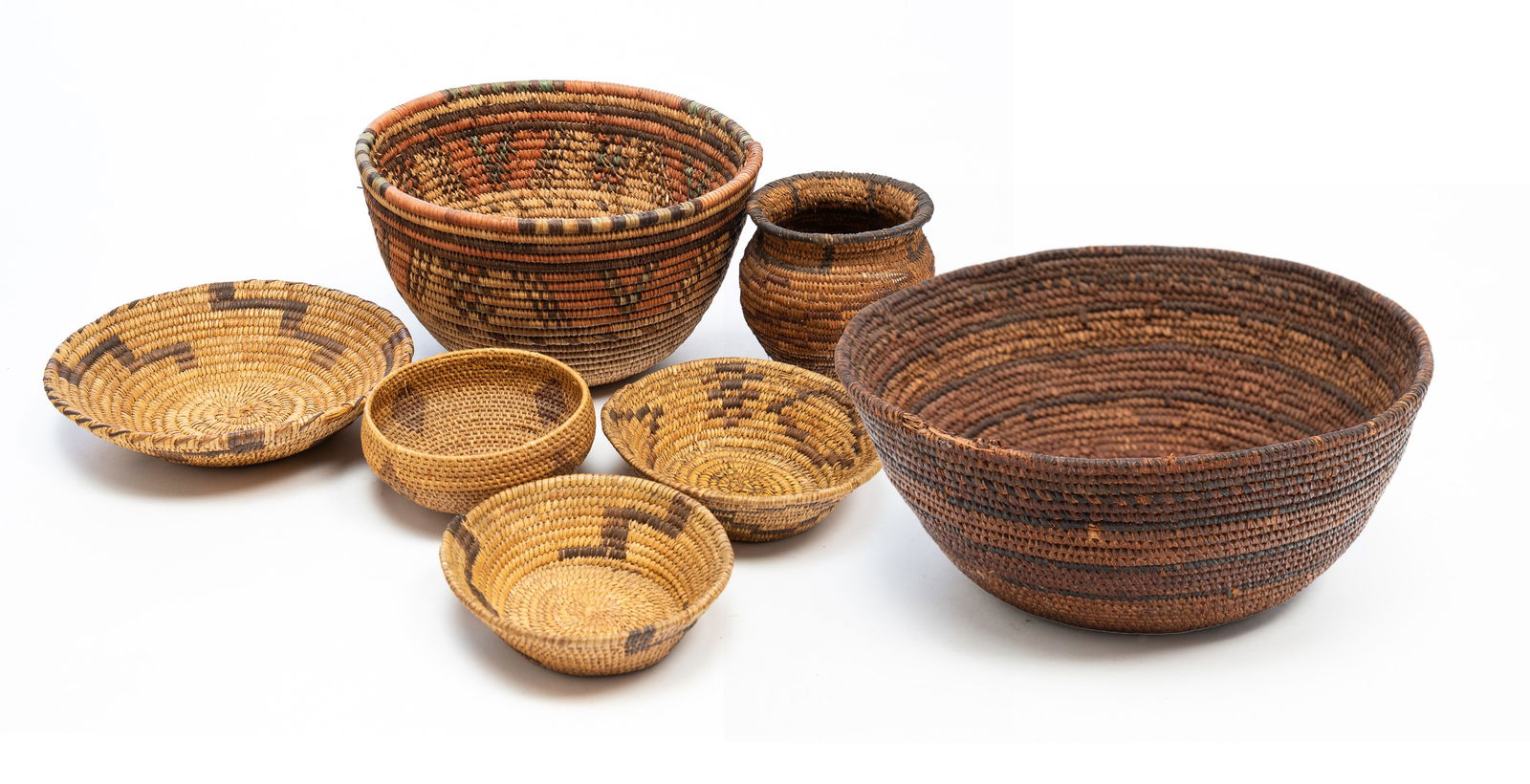 SEVEN SOUTHWEST NATIVE AMERICAN BASKETS. Largest, 6.5"h. 11.75"d. (1 of 9)