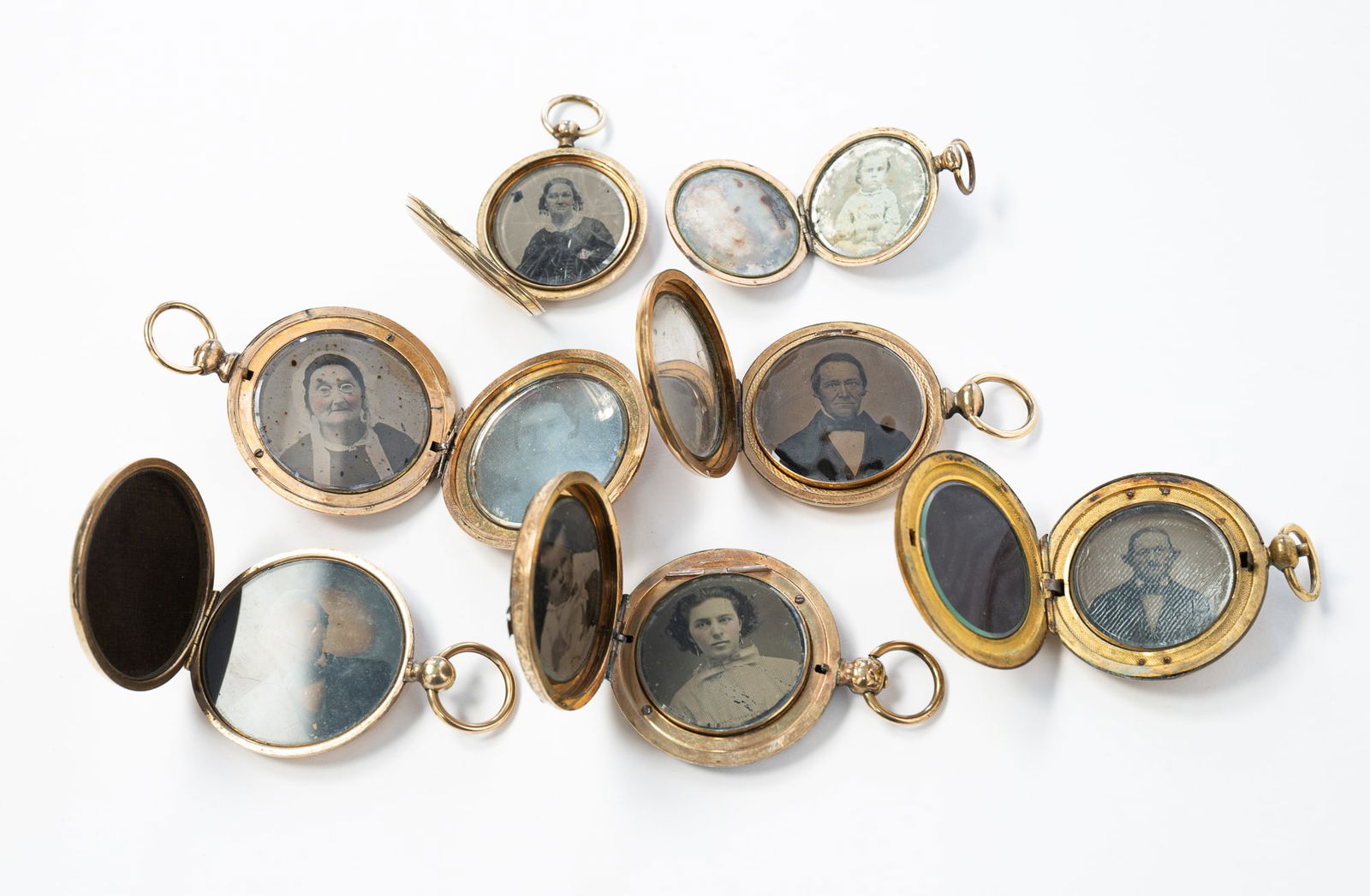 SEVEN VICTORIAN PORTRAIT LOCKETS. Largest, 1.75"d. Smallest, 1.25"d. (1 of 3)