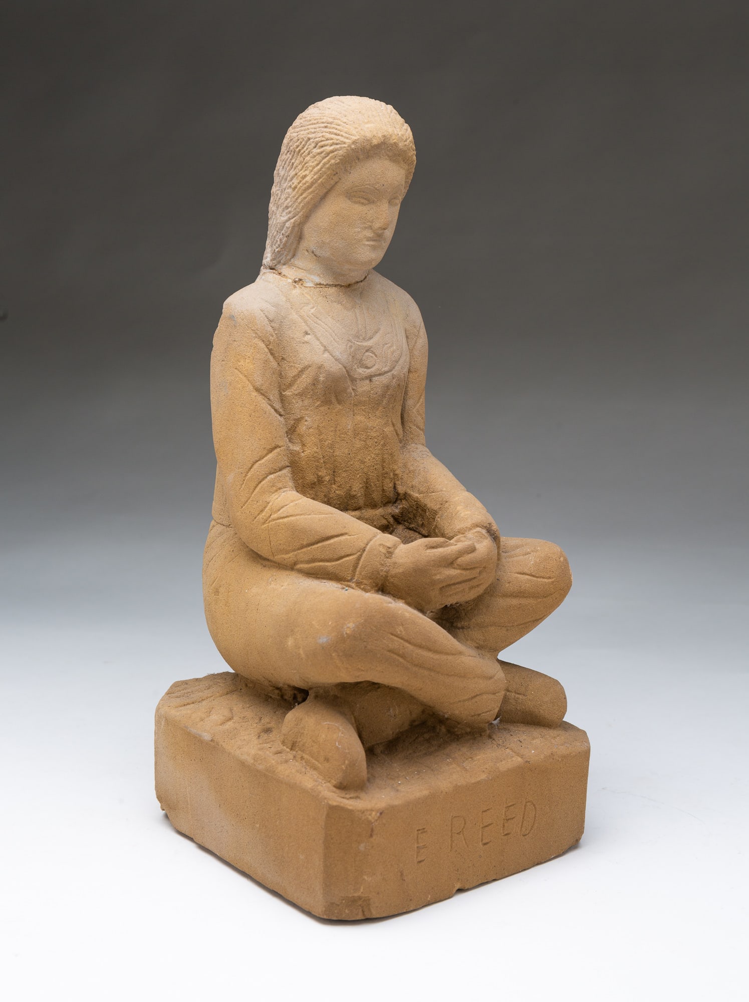 ERNEST "POPEYE" REED (OHIO, 1919-1985) FOLK ART CARVED STONE DIMINUTIVE SCULPTURE OF A SEATED WOMAN. (1 of 5)