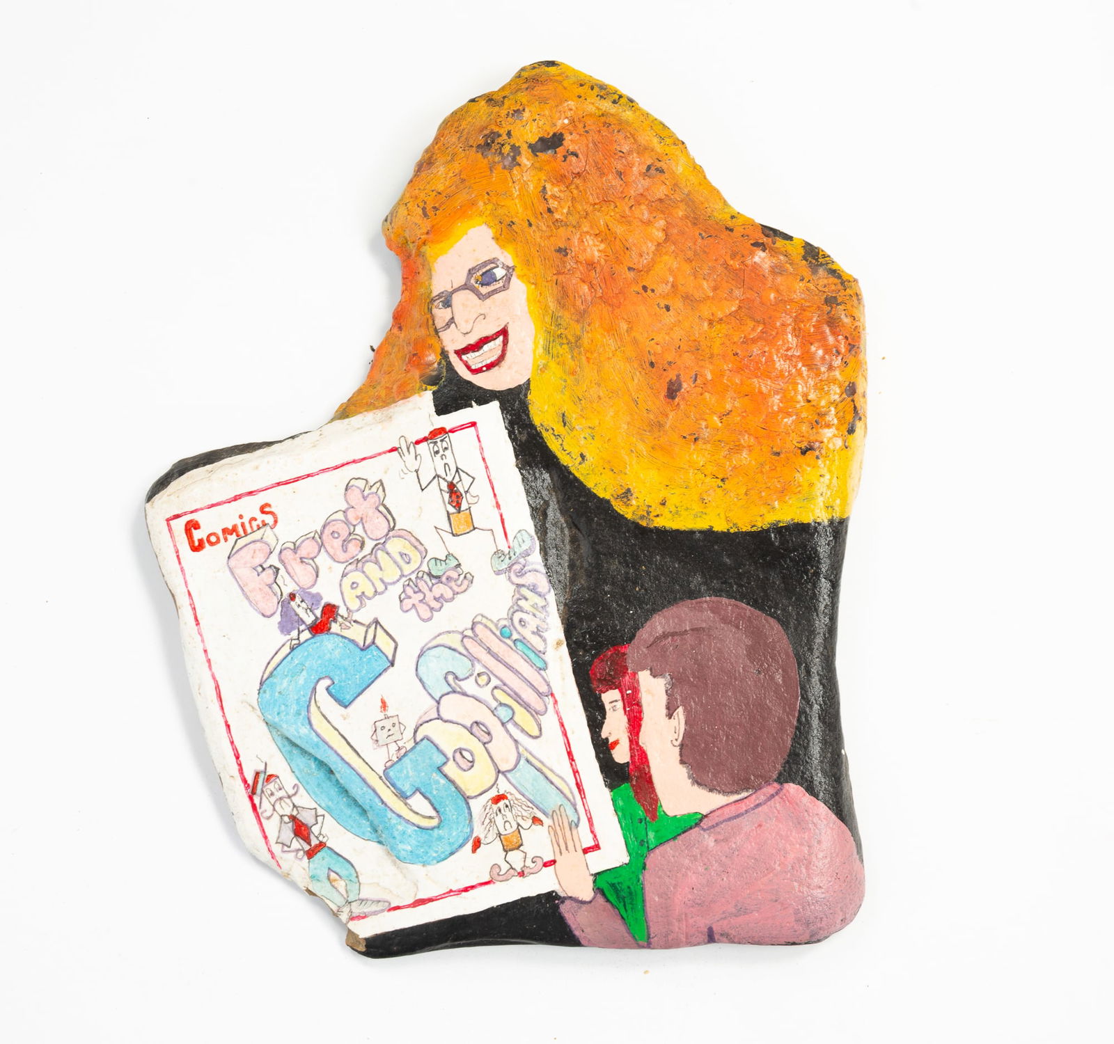 "FRET AND THE GOOFILIANS" OUTSIDER ART PAINTED ROCK. 1"h. 11"w. 13"d.: American, 20th century. Flat rock painted with a scene of a comic and three people looking at it.Provenance: From the Lifetime Collection of Chuck Auerbach.SHIPPING: All purchases from Amelia Jeffers,