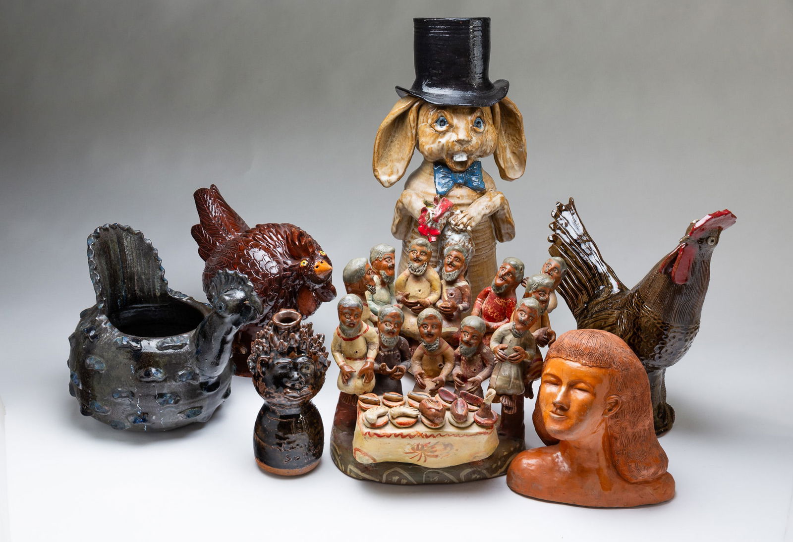 GROUPING OF FOLK ART CERAMICS, INCL. MARIE ROGERS (MEANSVILLE, GEORGIA, 1922-2010) FACE JUG. Rabbit, (1 of 12)