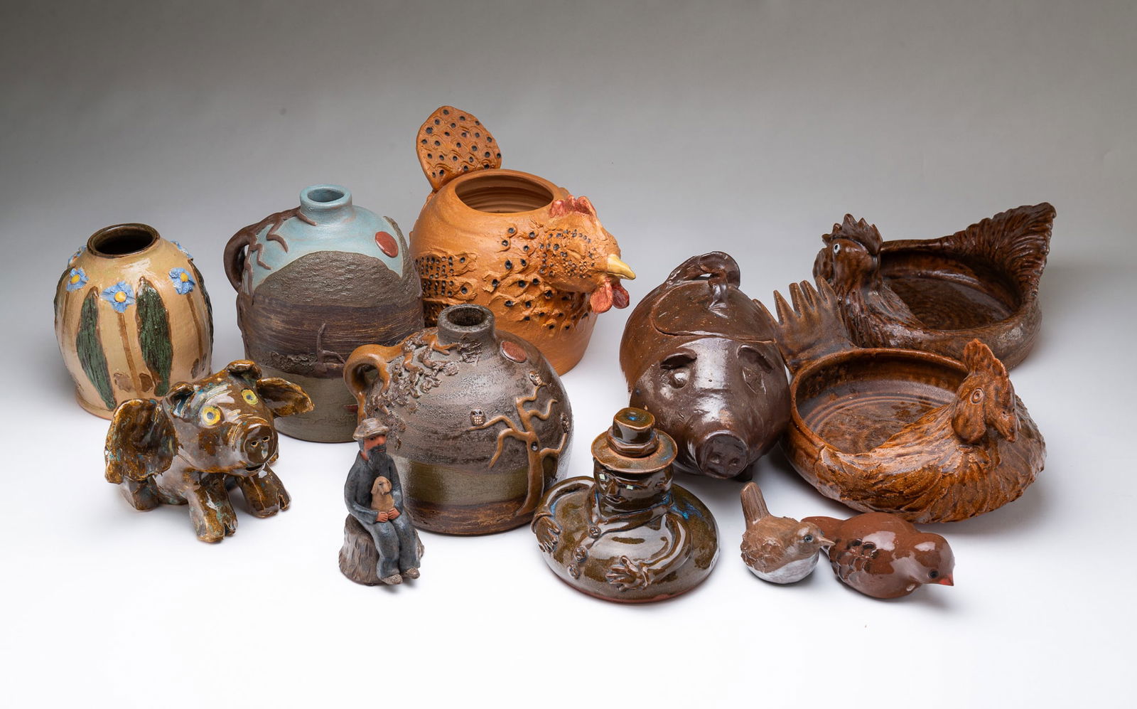 GROUP OF FOLK ART CERAMICS. Largest, 8"h. 6.5"w. 10"d. (1 of 10)