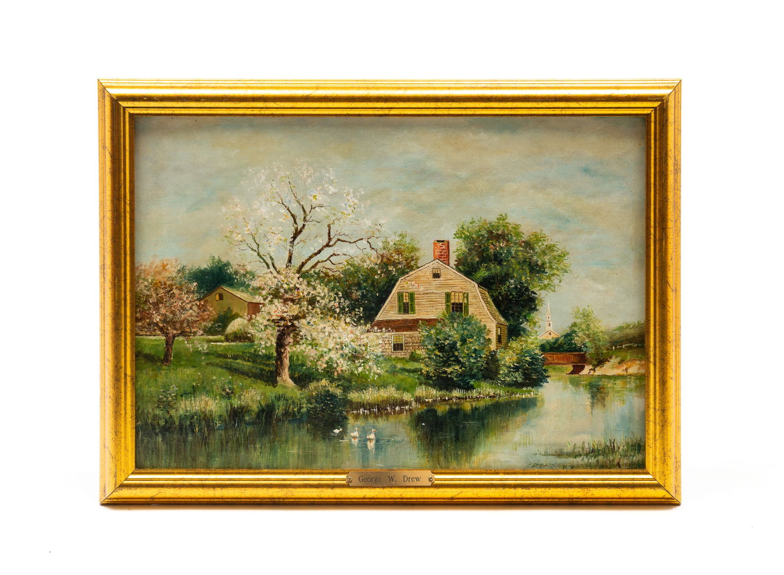ATTRIBUTED TO GEORGE W. DREW (AMERICAN, 1875-1968) OIL ON ARTIST'S BOARD LANDSCAPE. Frame, 12.25"h.: American, First half 20th Century. Pleasant Spring scene of a gambrel-roofed house with a center chimney on the banks of a stream with a bridge and church in the background. Modern gold leaf frame.SHI
