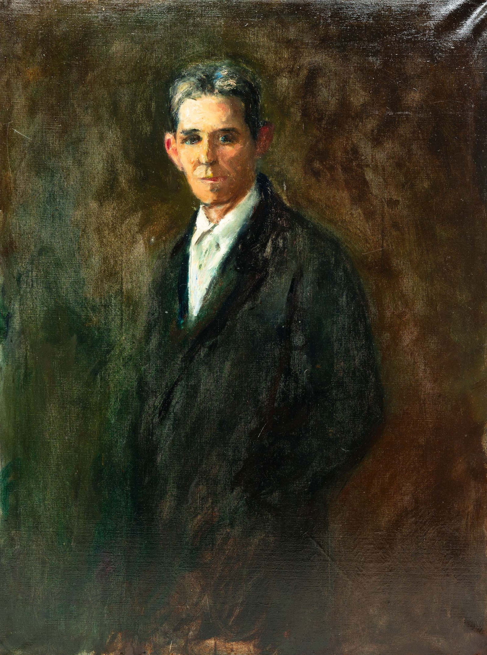 OIL ON CANVAS PORTRAIT OF A GENTLEMAN. Frame, 52"h. 40"w. Canvas, 48"h. 36"w.: American, First half 20th Century. Three-quarter length portrait of a man with blue eyes and greying hair wearing an open neck white shirt and black jacket. Unsigned. In a modern frame.SHIPPING: All p