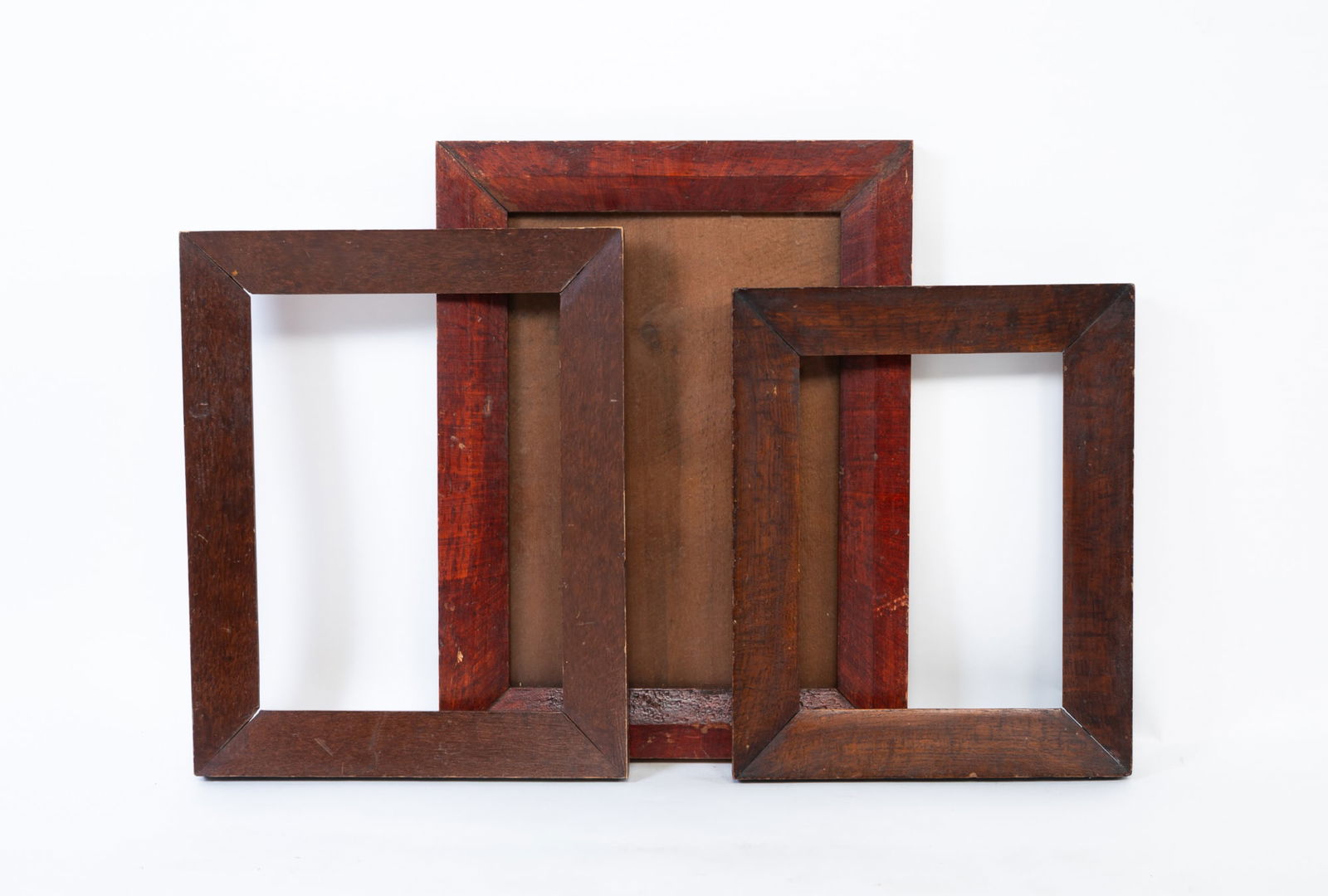 THREE VINEGAR-GRAINED WOOD PICTURE FRAMES. Largest, overall, 17.5"h. 13.5"w. Smallest, overall, (1 of 3)