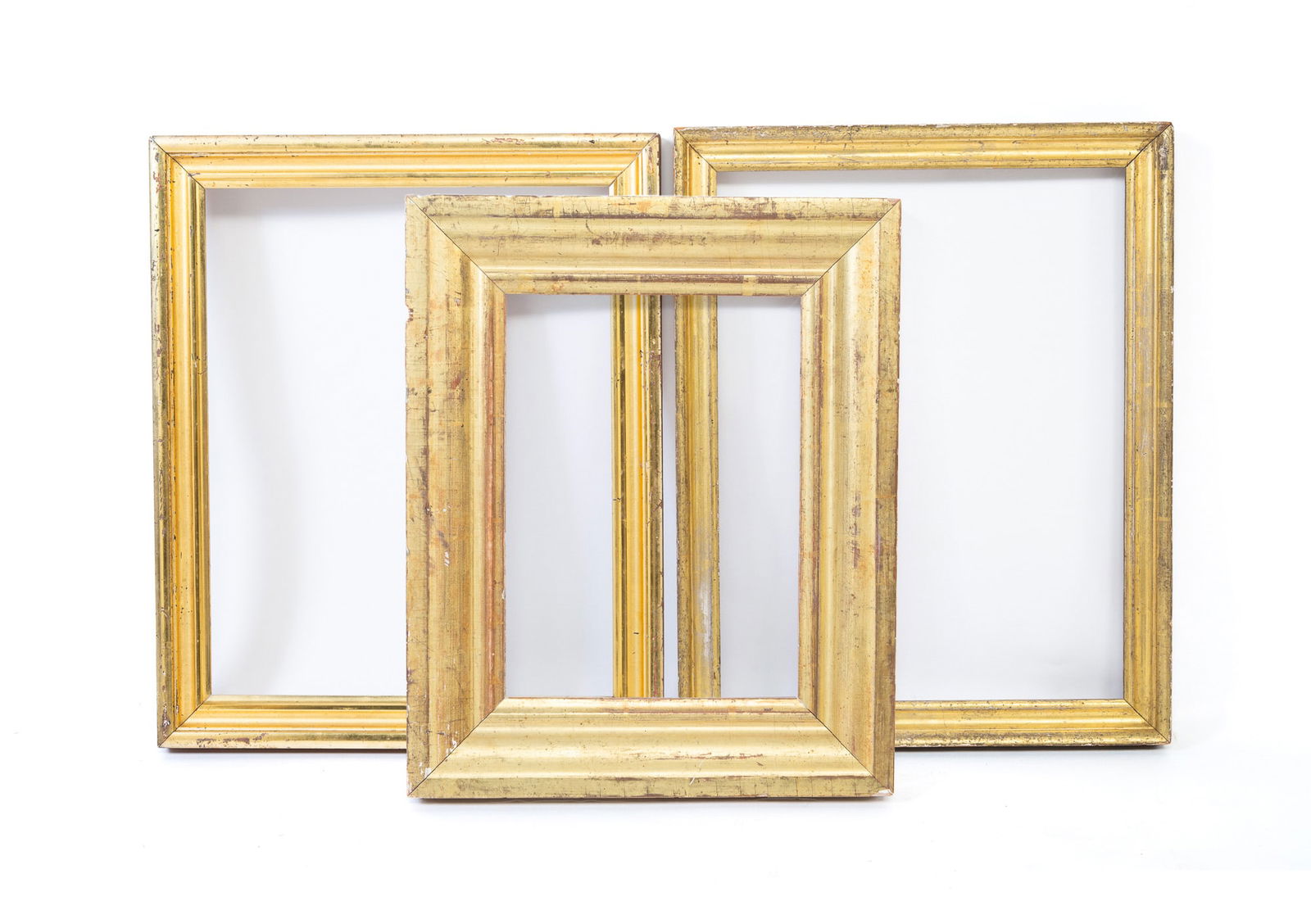 THREE GILTWOOD PICTURE FRAMES. The largest, overall, 17.5"h. 14.5"w. (1 of 7)