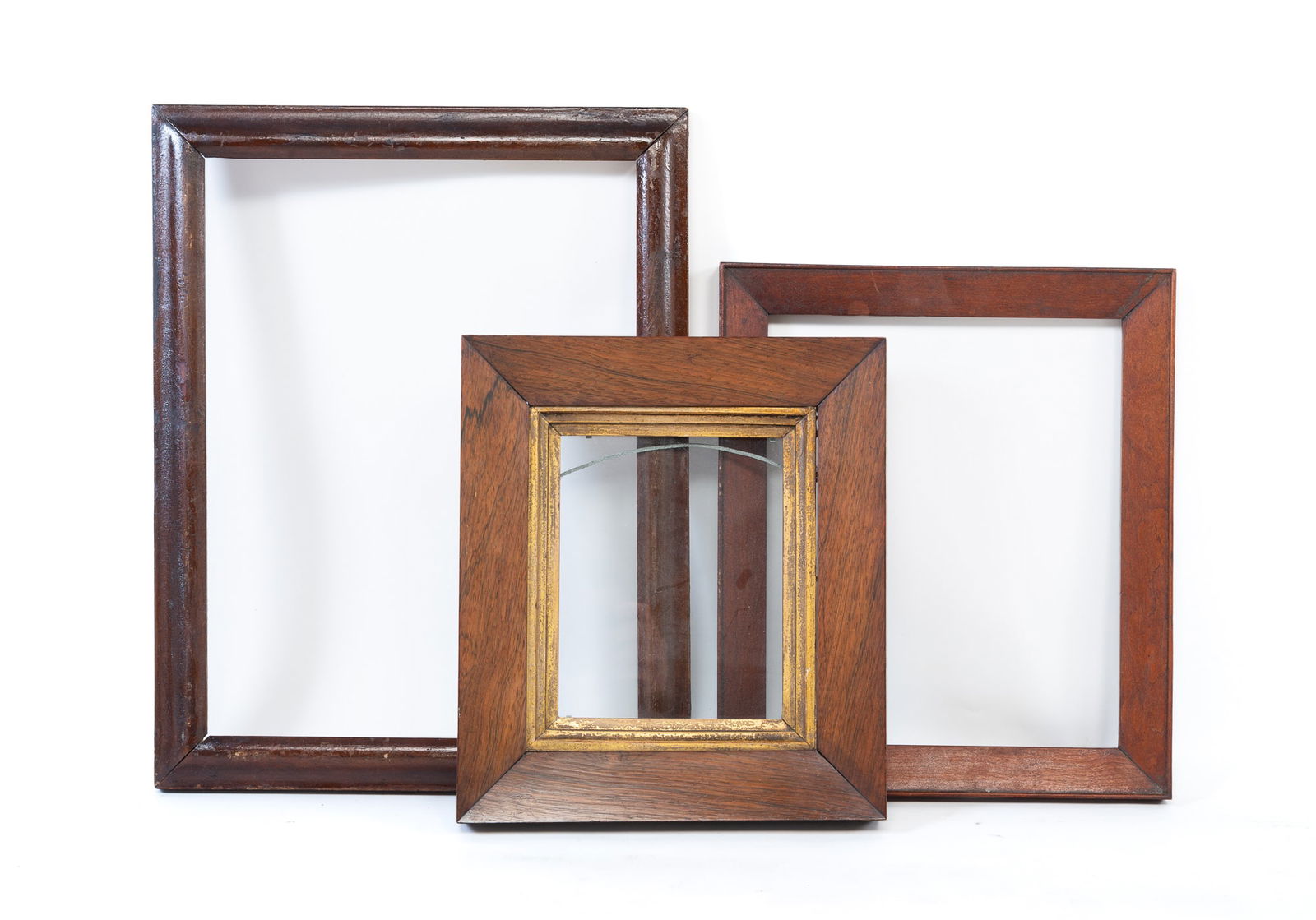 THREE WOOD PICTURE FRAMES, INCL. ROSEWOOD EXAMPLE. Rosewood frame, overall, 12.75"h. 11.25"w. (1 of 3)