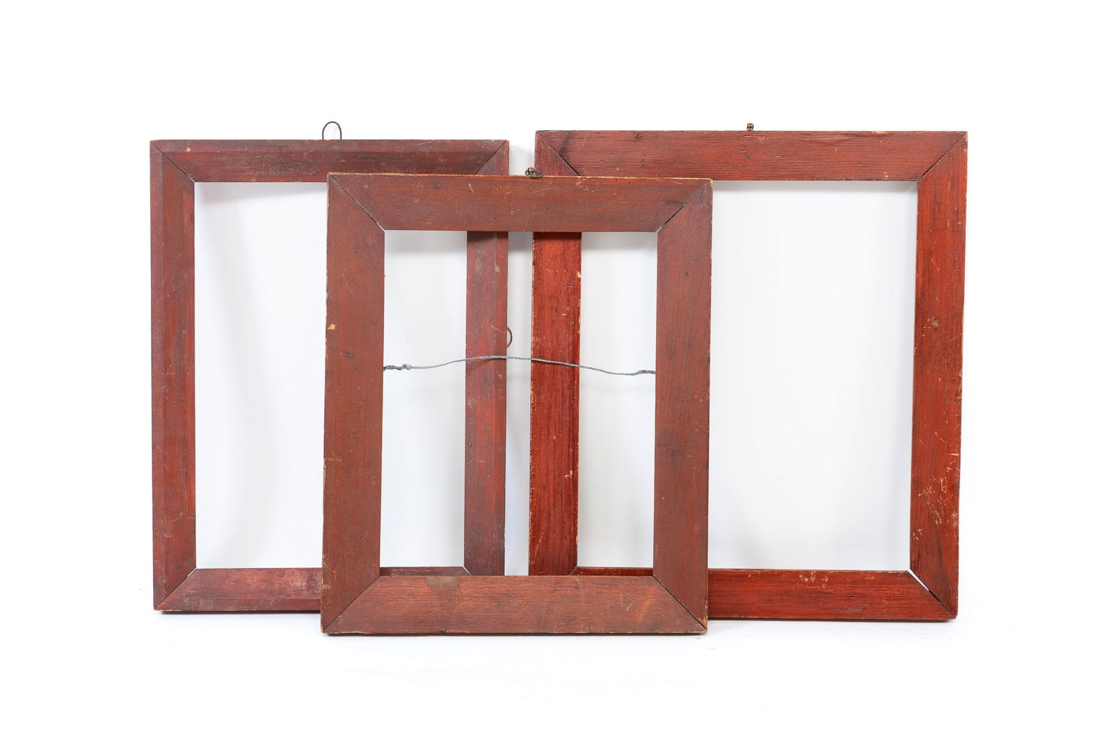 THREE RED-PAINTED WOOD PICTURE FRAMES. Largest, overall, 17"h. 15"w. (1 of 3)