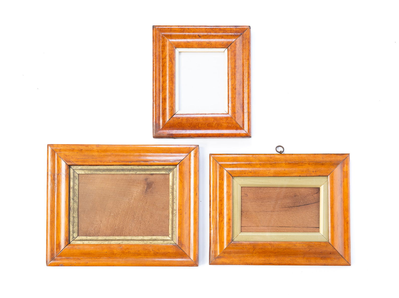THREE BIRD'S-EYE MAPLE PICTURE FRAMES. Largest, overall, 9.5"h. 7.75"w. (1 of 3)