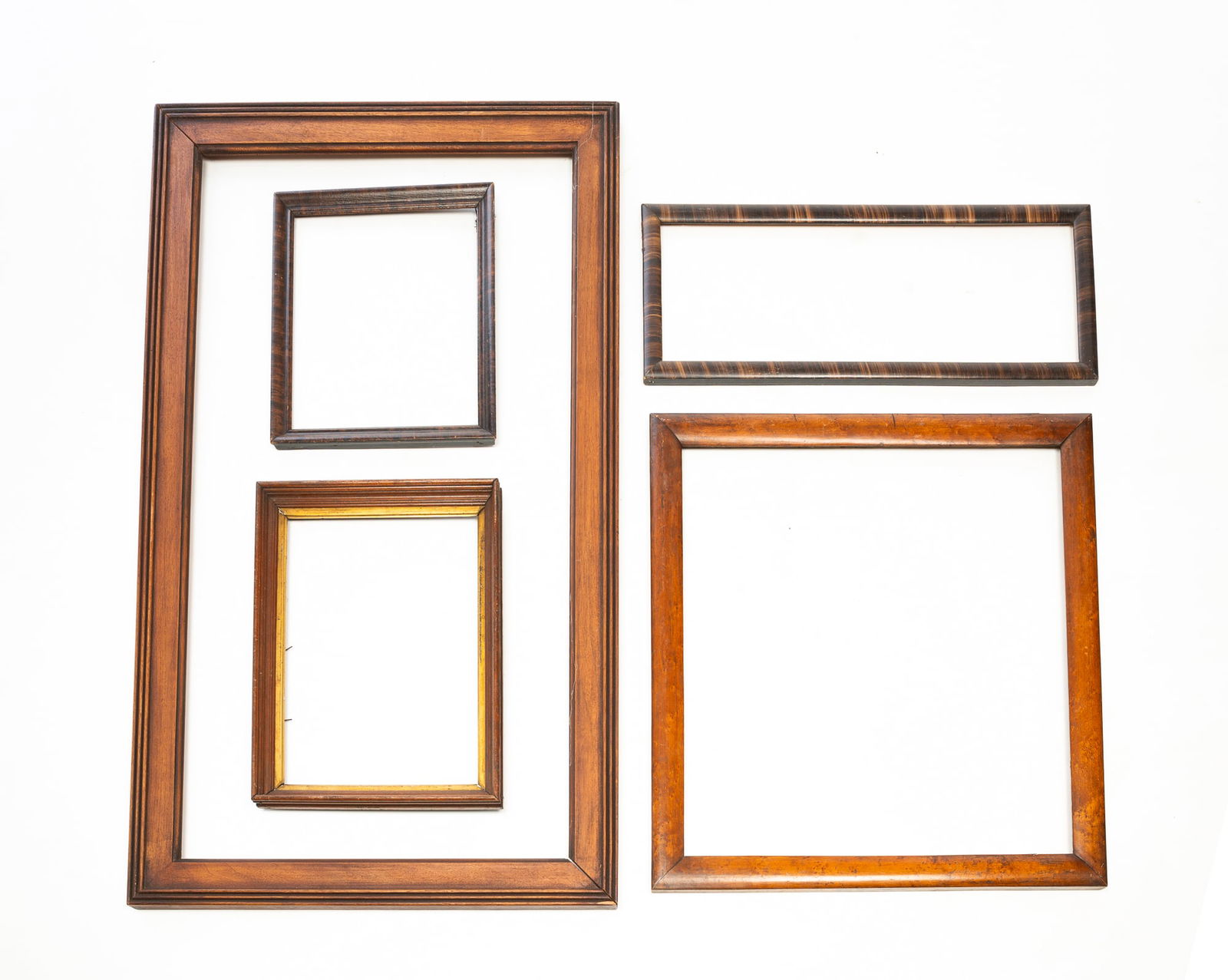 FIVE WOOD PICTURE FRAMES. Largest, 24.25"h. 42"w. Smallest, 11.5"h. 13.5"w. (1 of 4)