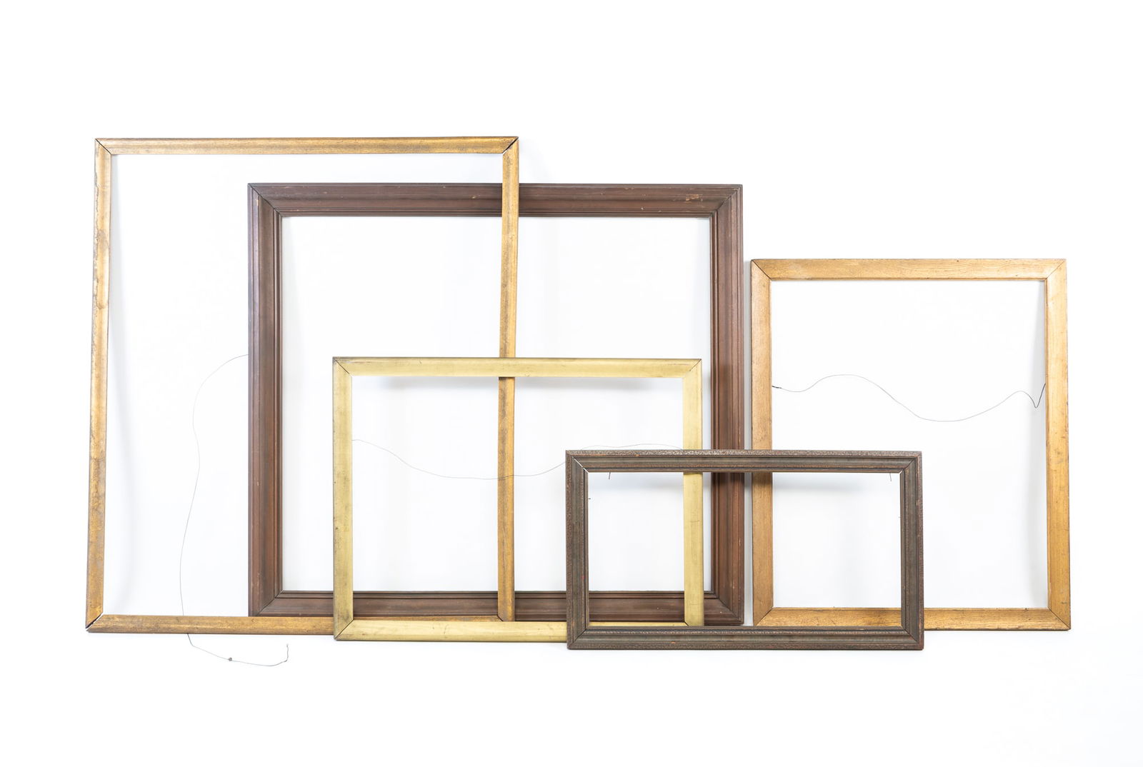 FIVE LARGE WOOD PICTURE FRAMES. The largest, overall, 40"h. 45"w. The smallest, overall, 31.5"h. (1 of 4)
