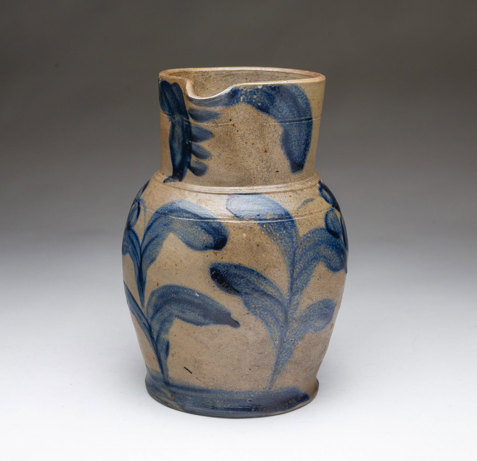 PENNSYLVANIA COBALT-DECORATED STONEWARE HALF-GALLON PITCHER. (1 of 4)