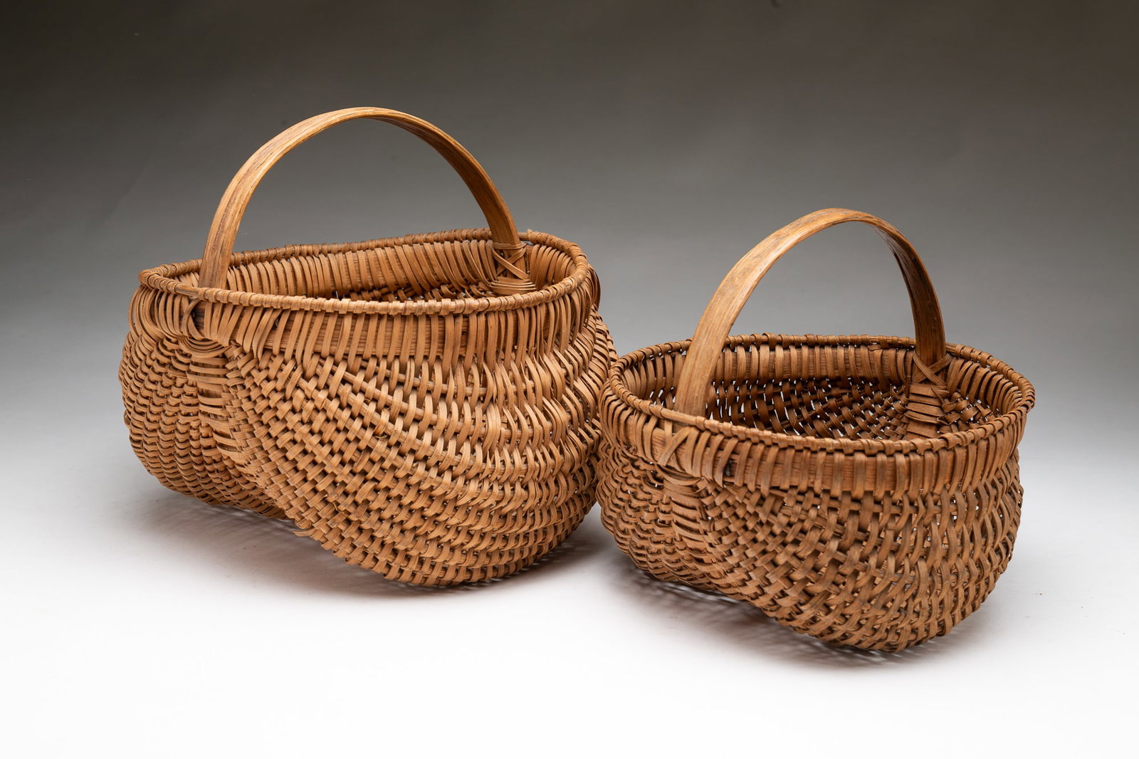 TWO AMERICAN SPLINT-WOVEN BUTTOCKS BASKETS. - 2