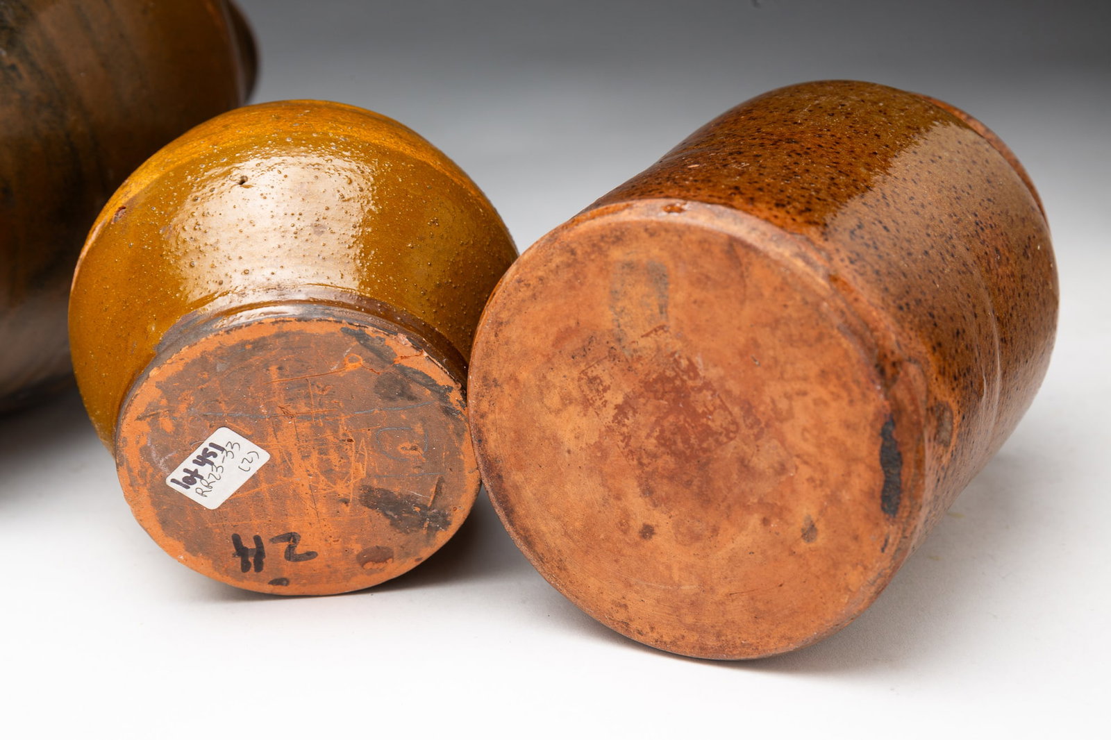 FOUR STONEWARE AND REDWARE ITEMS. - 4