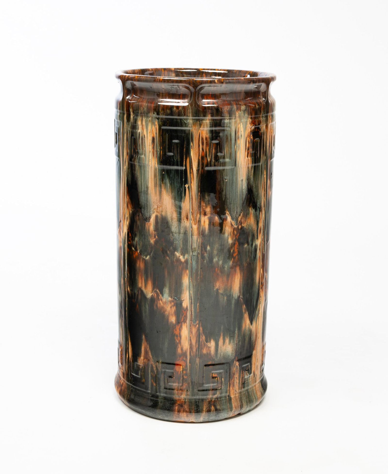 AMERICAN ART POTTERY GLAZED UMBRELLA STAND.: AMERICAN ART POTTERY GLAZED UMBRELLA STAND. 20th Century. Greek key design at top and high mottled glaze. 20.75"h. 20.75"h.