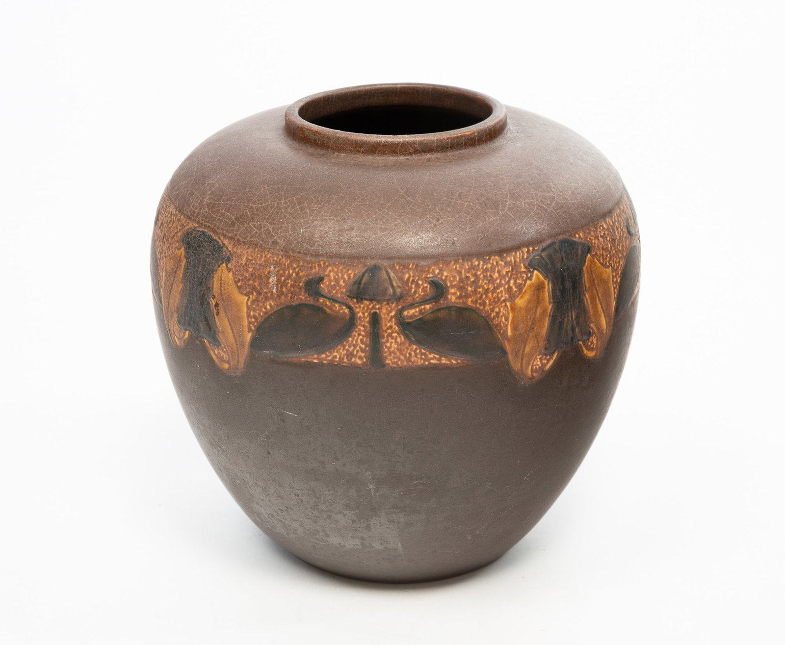 ROSEVILLE ART POTTERY (OHIO) "VICTORIAN? VASE.: American, ca. 1920. Graceful line, dark brown crackle matte glaze, and embossed horizontal band of swans and foliage. Partial R.V. cobalt mark on bottom. 10"h.Provenance: From the late George Shahady