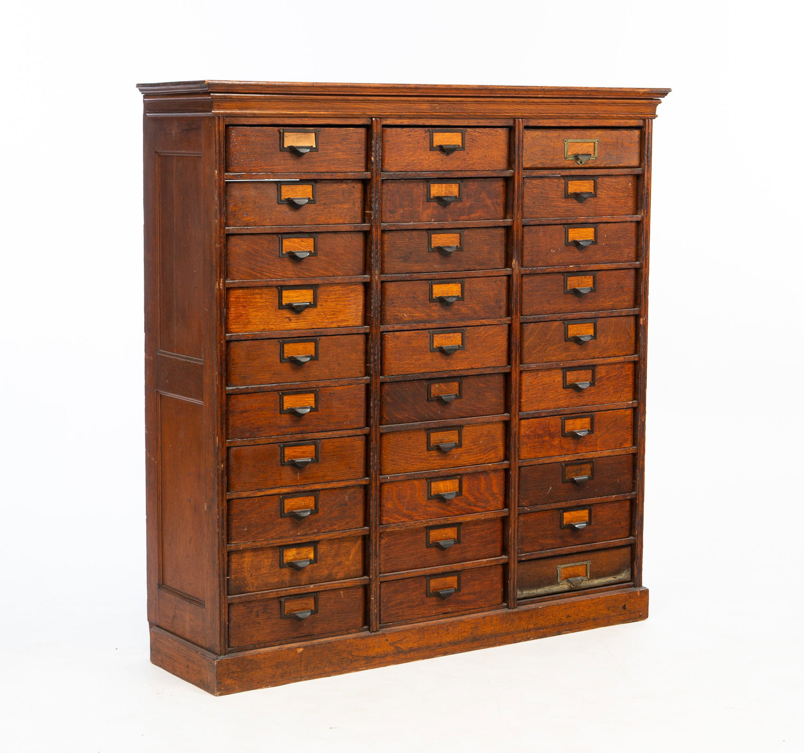E.H. STAFFORD CO. (GRAND RAPIDS, MICHIGAN) OAK THIRTY-DRAWER FILE CABINET. (1 of 4)