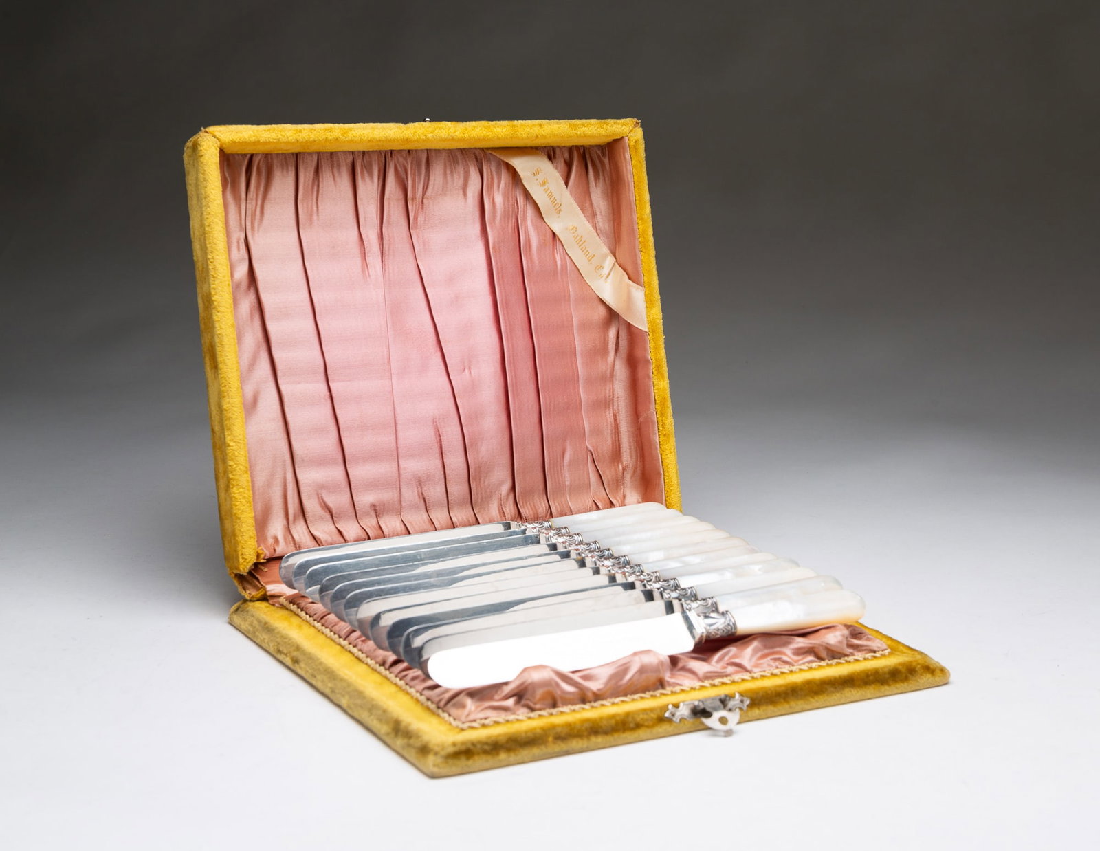 SET OF TWELVE GORHAM MOTHER-OF-PEARL HANDLED KNIVES. (1 of 6)