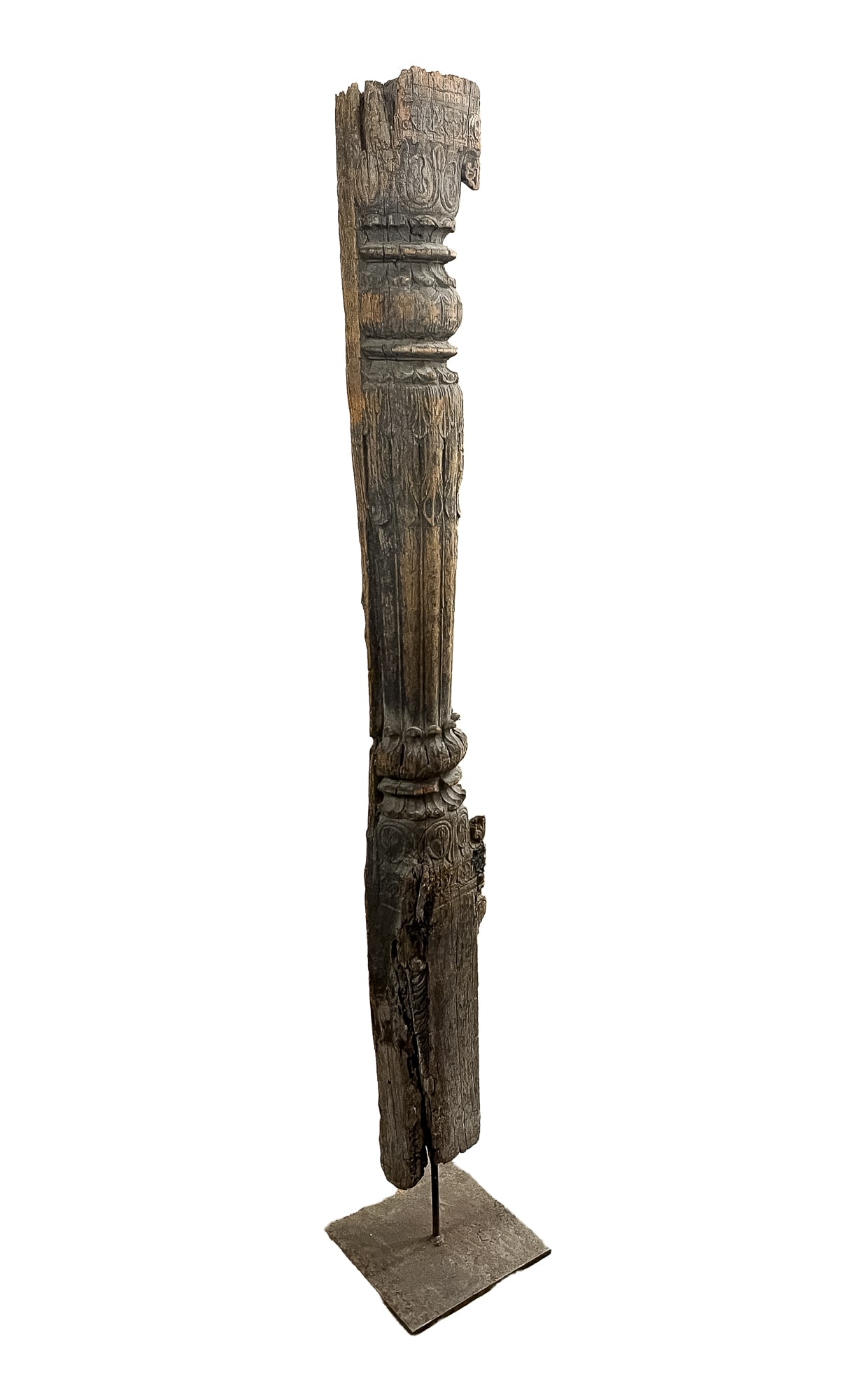 ASIAN CARVED HARDWOOD ARCHITECTURAL COLUMN.: 19th Century. Half-round column with rough-hewn back. Front with heavy reeding, floral incised carvings, and leafy detail. Mounted on a heavy metal base. 76.5"h.