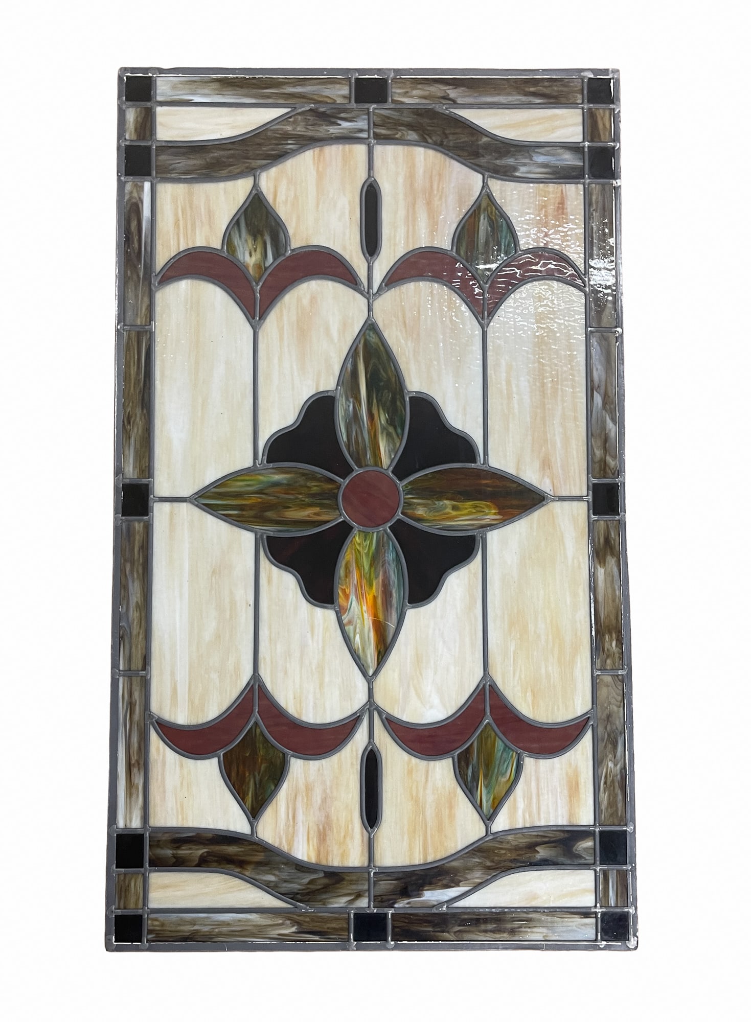AMERICAN STAINED AND LEADED GLASS PANEL.: AMERICAN STAINED AND LEADED GLASS PANEL. 20th Century. Multicolor slag and colored glass in a geometric and bracket pattern. 27.5"h. 46.75"w. Provenance: From the Lifetime Collection of the late Ken H