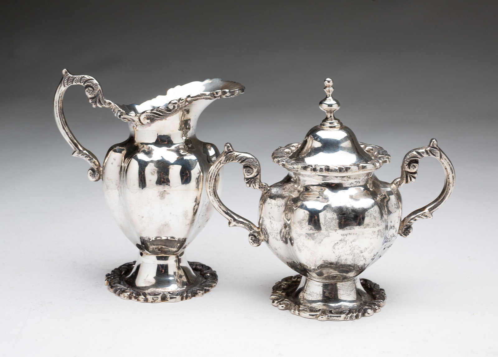 MEXICAN STERLING SILVER CREAMER AND LIDDED SUGAR. (1 of 3)