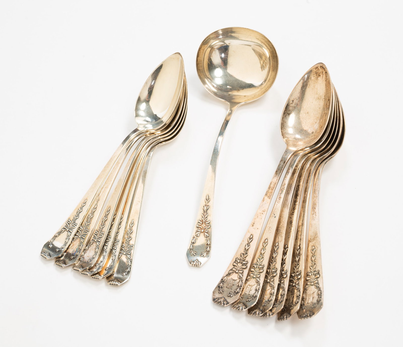 GROUP OF WHITING STERLING SILVER "MADAM JUMEL" FLATWARE.: American, pat. 1908. Twelve spoons in two sizes, 5.5"l. and 5.75"l., and a sauce ladle, 5.75"l. Approximately 10.0 ozt.**Note: Bidders who are not yet established with our firm will be required to