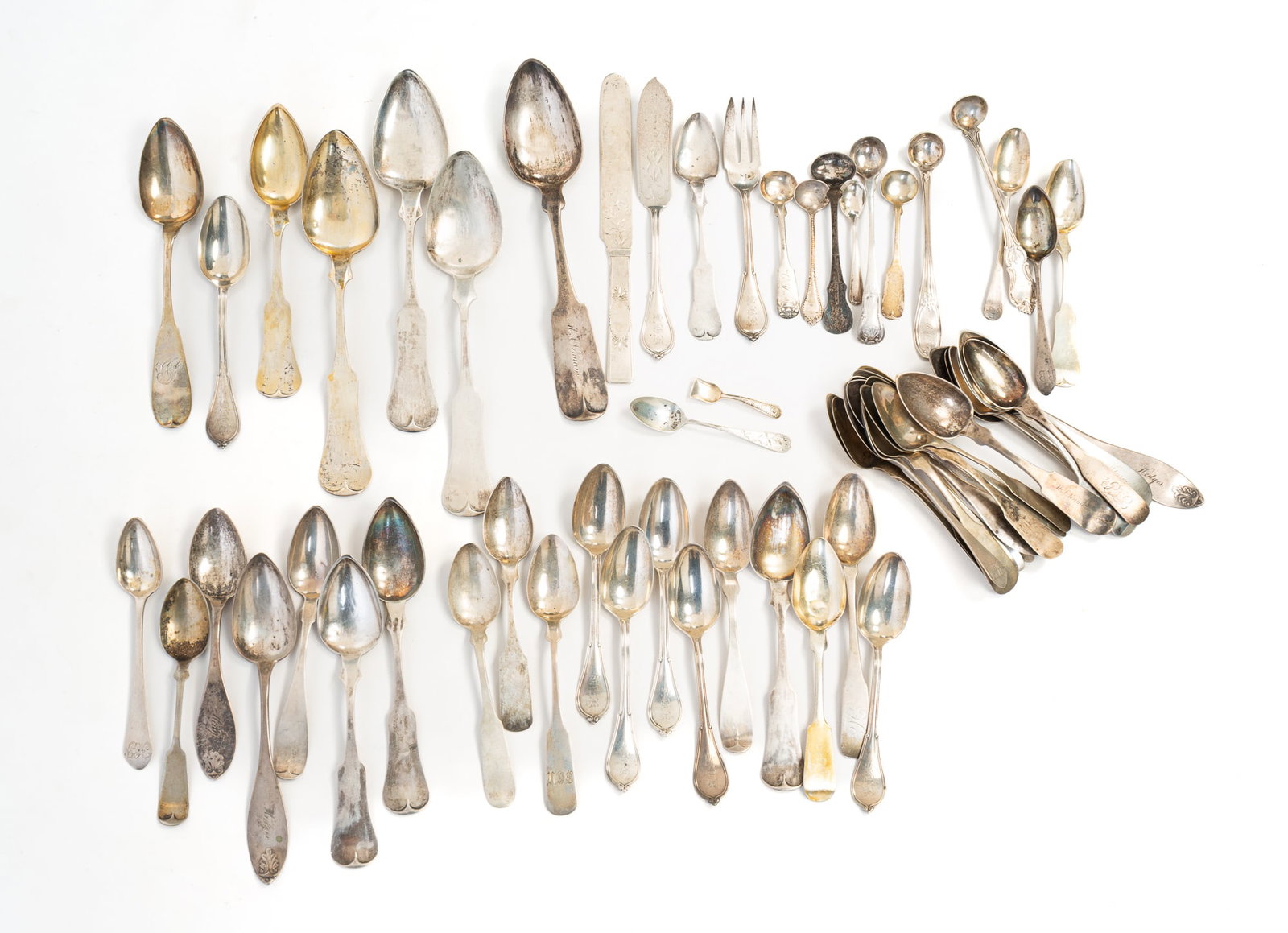 COLLECTION OF COIN SILVER, INCL. E. & D. KINSEY (CINCINNATI, OHIO).: Mostly American, Mid-19th Century. Some makers are E. & D. Kinsey of Cincinnati, Ohio, J.R. Reed of Pittsburgh, Gorham, G. Harbottle, and others. Mostly fiddleback examples. Approximately 35