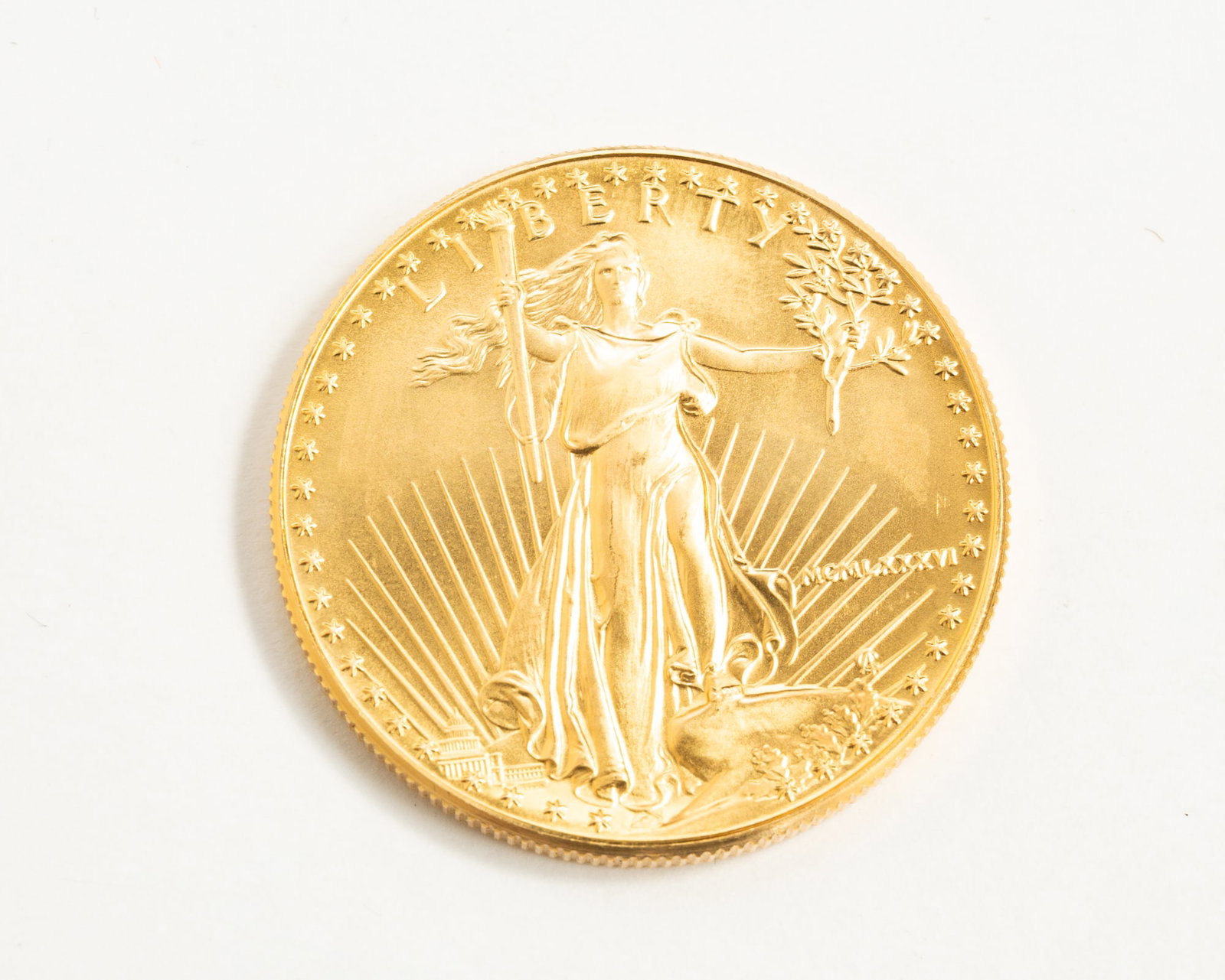 1986 50-DOLLAR AMERICAN GOLD EAGLE COIN. (1 of 2)