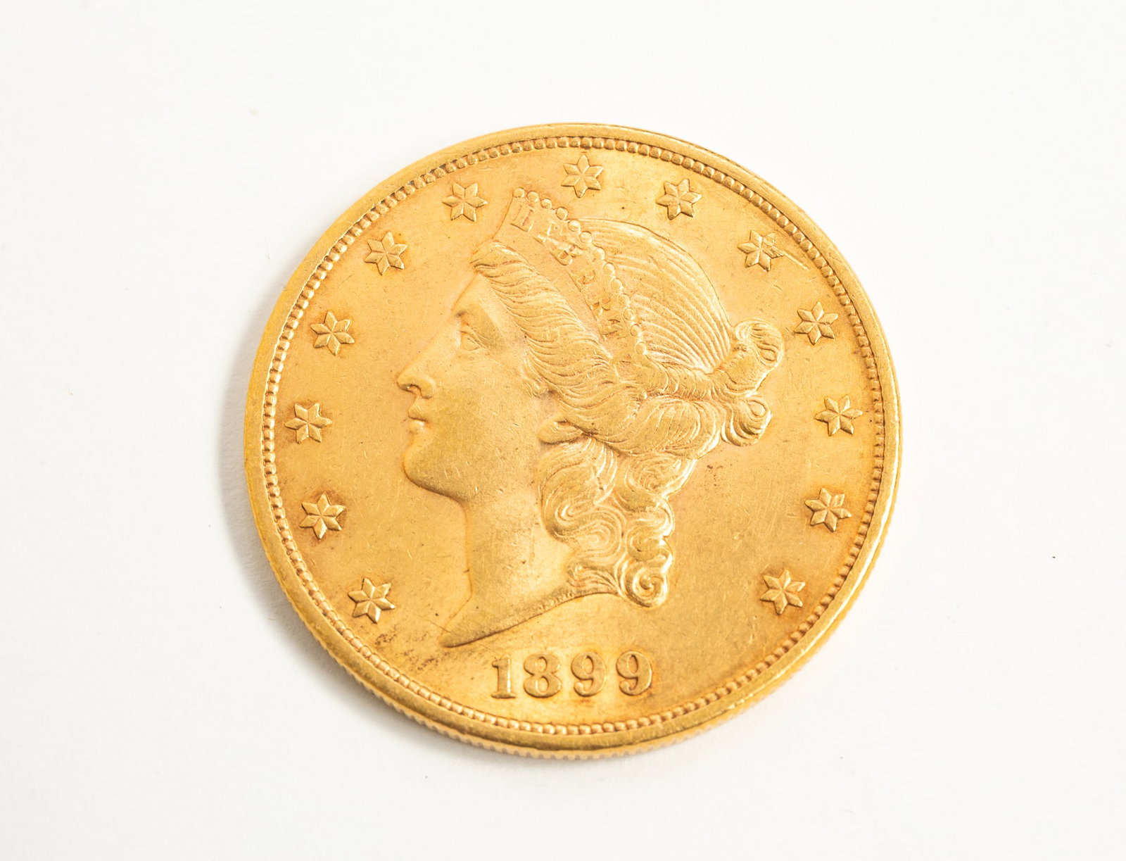 1899 LIBERTY HEAD DOUBLE EAGLE GOLD $20 COIN. (1 of 2)