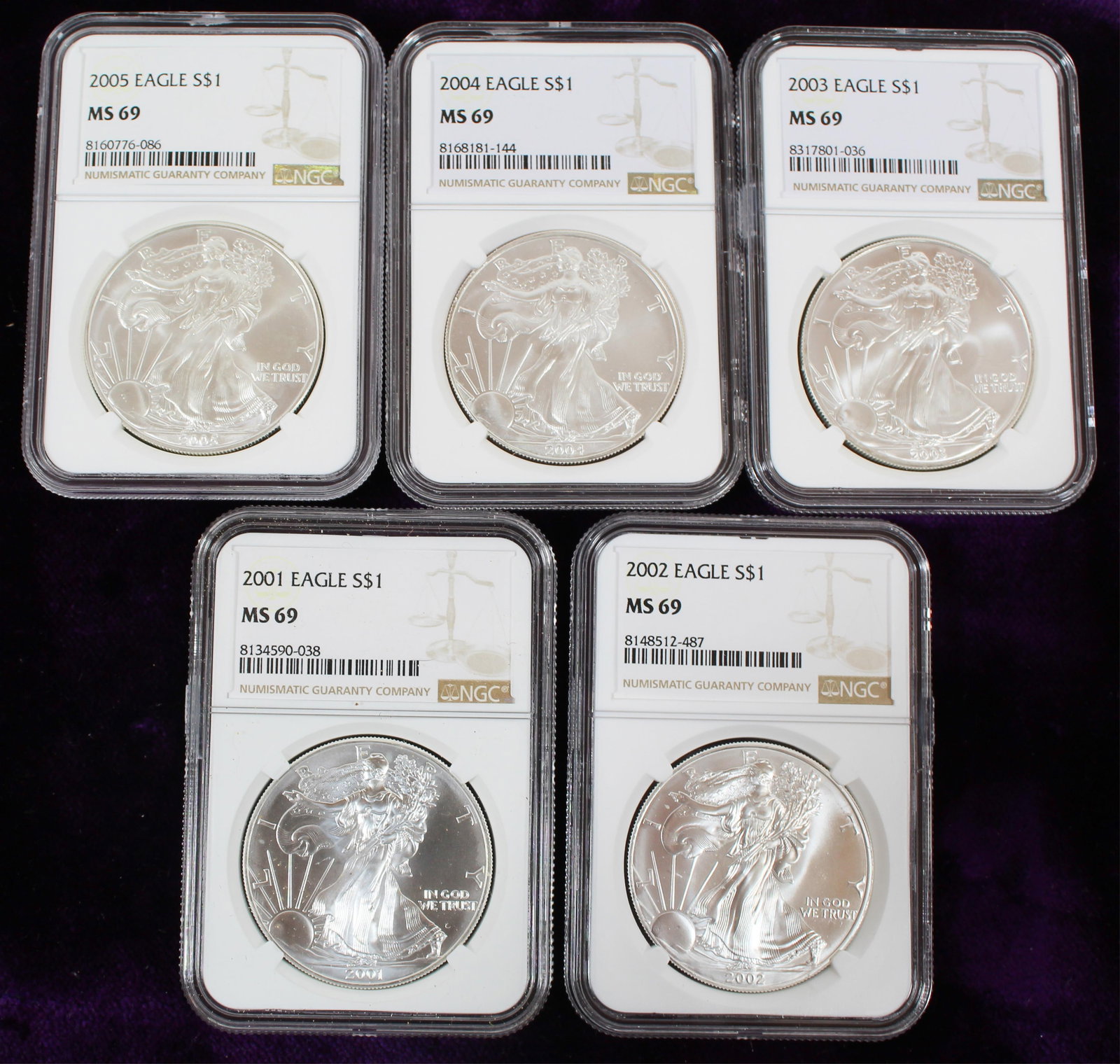 GROUP OF 5 U.S. SILVER EAGLE COINS MS69 2001-2005. (1 of 3)