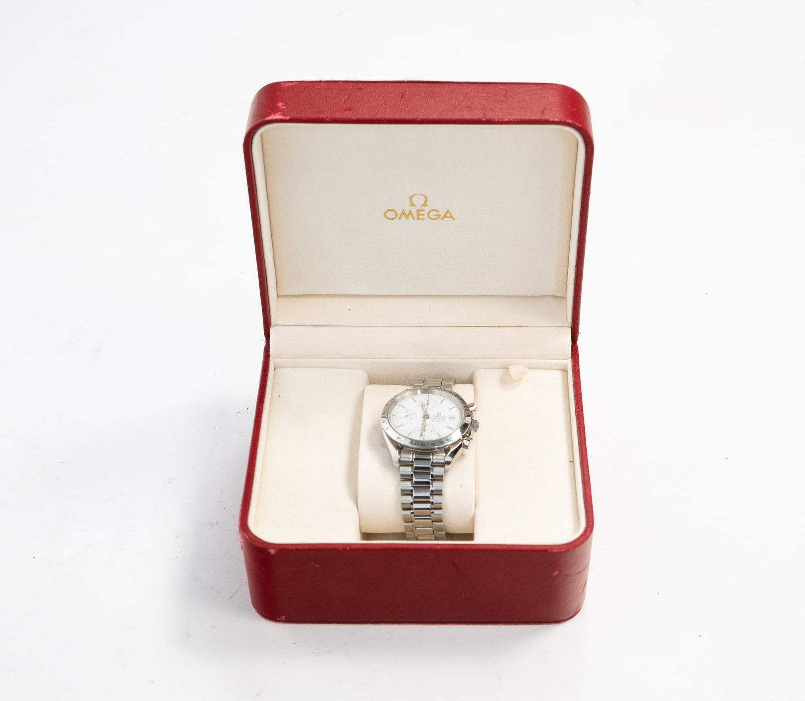 OMEGA SPEEDMASTER 3313.20 WRISTWATCH.: Contemporary. Stainless steel watch case and band with a white twelve-hour dial, three second dials, a date window, and the Speedmaster back. In original box with an extra link. 3.75"h. 6.5"w.