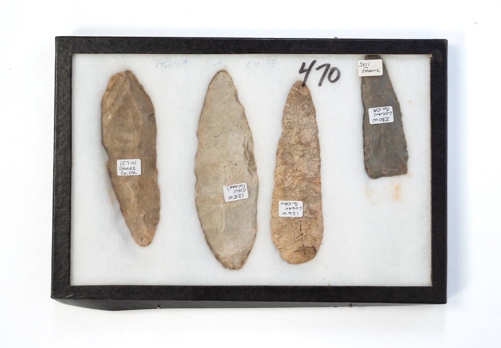 FOUR LARGE OHIO NATIVE AMERICAN STONE LANCES.: FOUR LARGE OHIO NATIVE AMERICAN STONE LANCES. Two are Logan County: Black with a flat bottom, 3.5"l and rounded bottom in mottled pink and grey, 5.75"l. Ward Township light grey, 6.25"l. And a tan