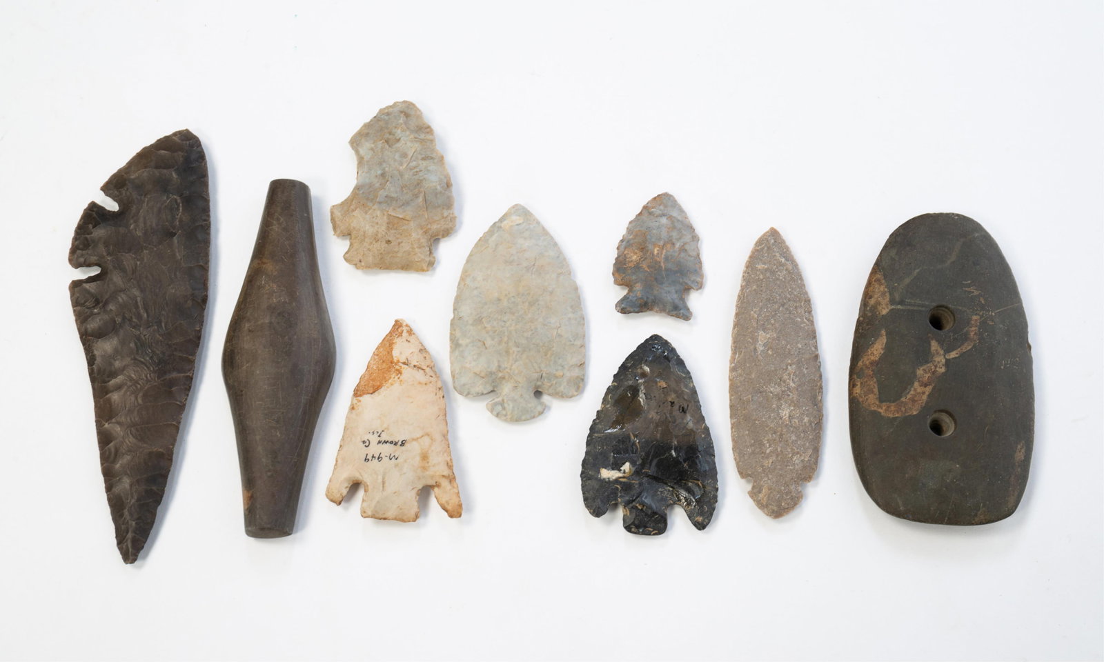 NINE NATIVE AMERICAN STONE ITEMS. (1 of 3)