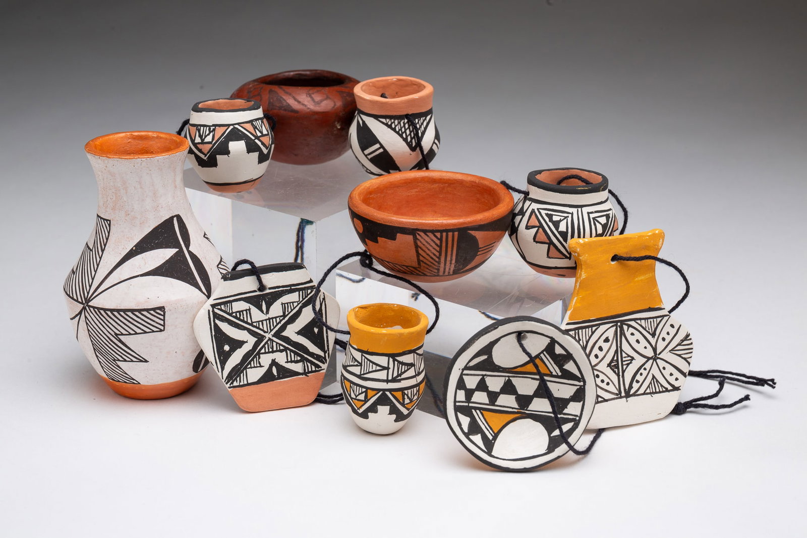 TEN MINIATURE NATIVE AMERICAN PUEBLO POTTERY ITEMS, INCL. NELLIE GARCIA (ACOMA) and R. PINO (1 of 7)