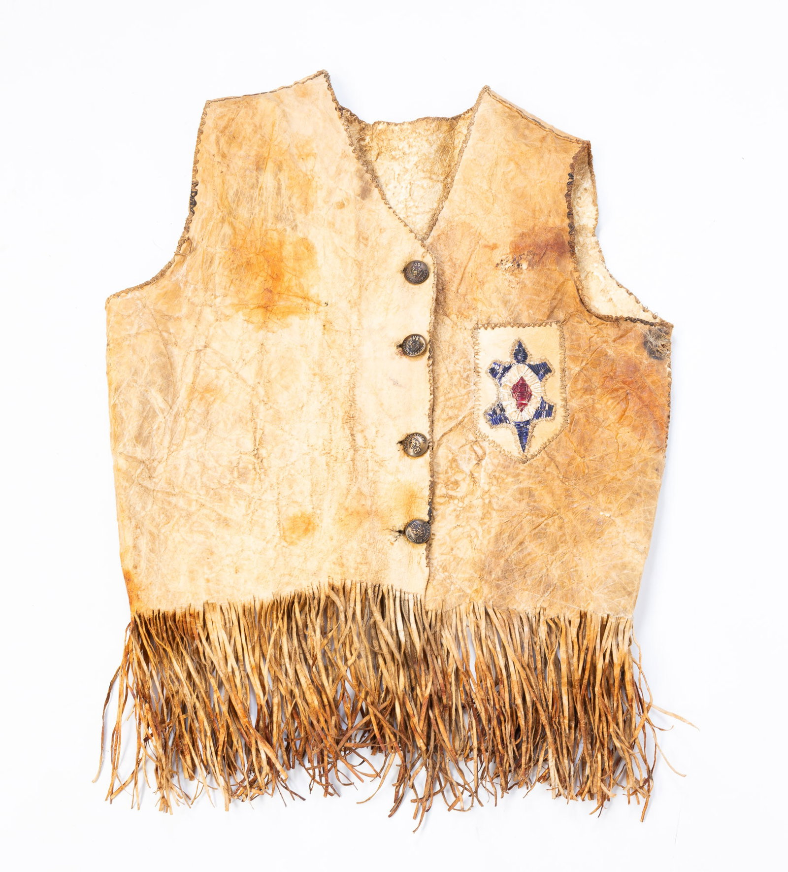 NATIVE AMERICAN HIDE VEST WITH FRINGE.: NATIVE AMERICAN HIDE VEST WITH FRINGE. Mid-19th Century. Tan hide vest, polychrome turtle decoration, fringe to bottom, and brass buttons that read "US INDIAN SERVICE." Provenance: From the Lifetime