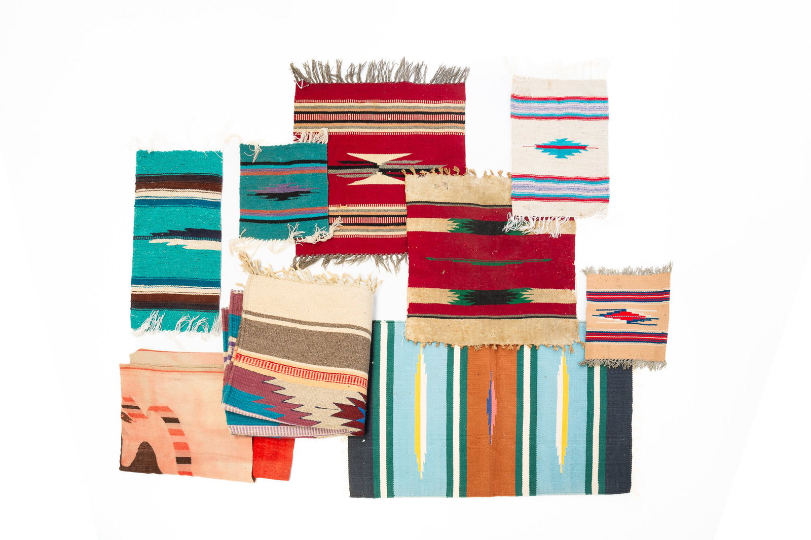 GROUP OF CHIMAYO AND MEXICAN SOUTHWESTERN MOTIF WOOL RUGS AND WEAVINGS. (1 of 7)