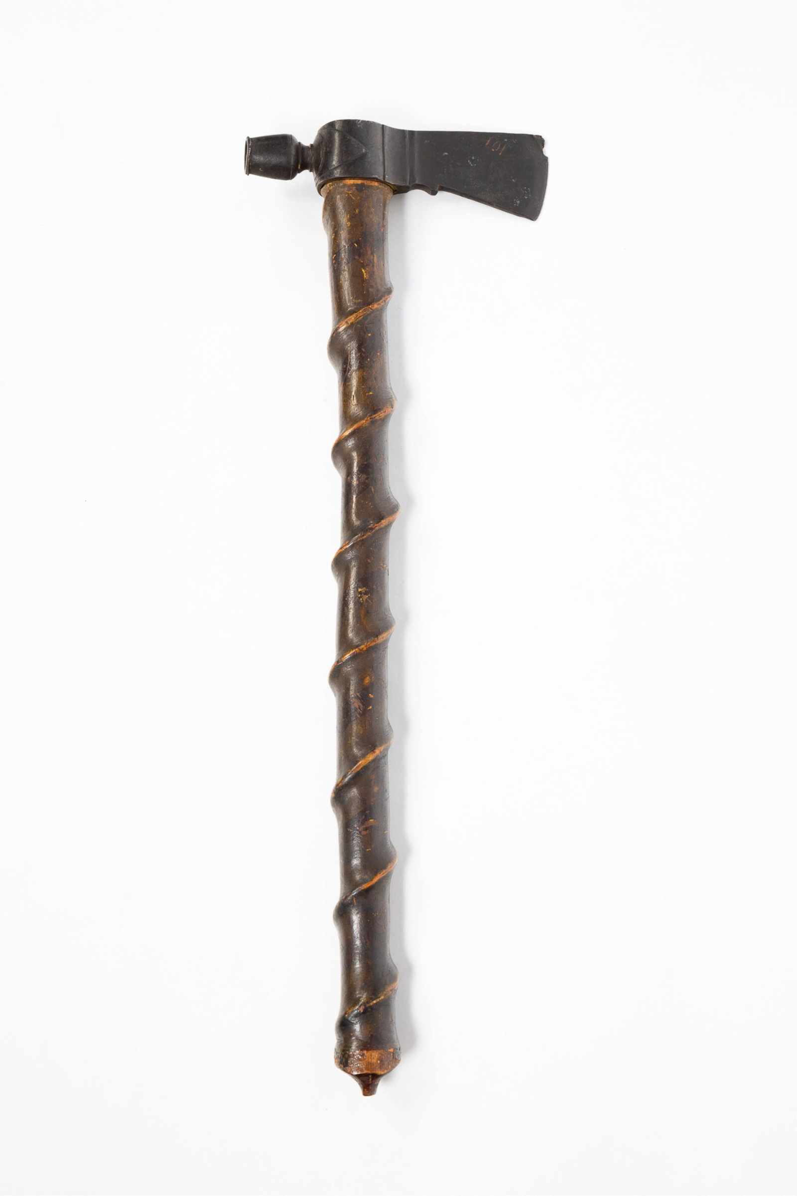 RARE EARLY BLACKSMITH-FORGED PIPE TOMAHAWK WITH ORIGINAL PAINTED HAFT.: RARE EARLY BLACKSMITH-FORGED PIPE TOMAHAWK WITH ORIGINAL PAINTED HAFT. Native American, Last quarter 18th Century. Original ash handle carved in a twisted-stem fashion with yellow (faded to brown)