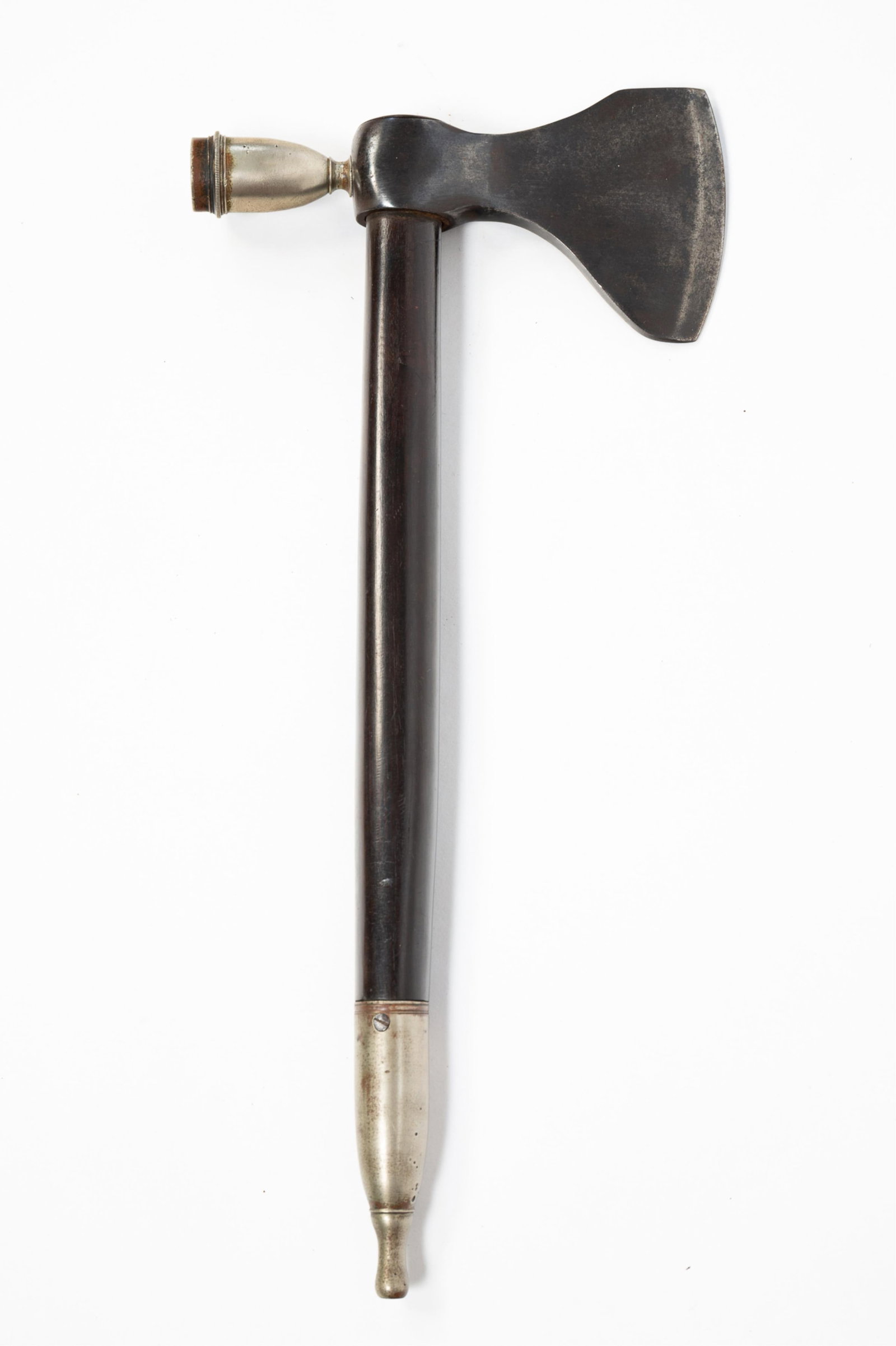 FINE NATIVE AMERICAN EBONY AND SILVER PRESENTATION PIPE TOMAHAWK.: FINE NATIVE AMERICAN EBONY AND SILVER PRESENTATION PIPE TOMAHAWK. 19th Century. Smooth ebony handle with German silver mouthpiece and steel end cap; cast steel head with detachable, screwed-off