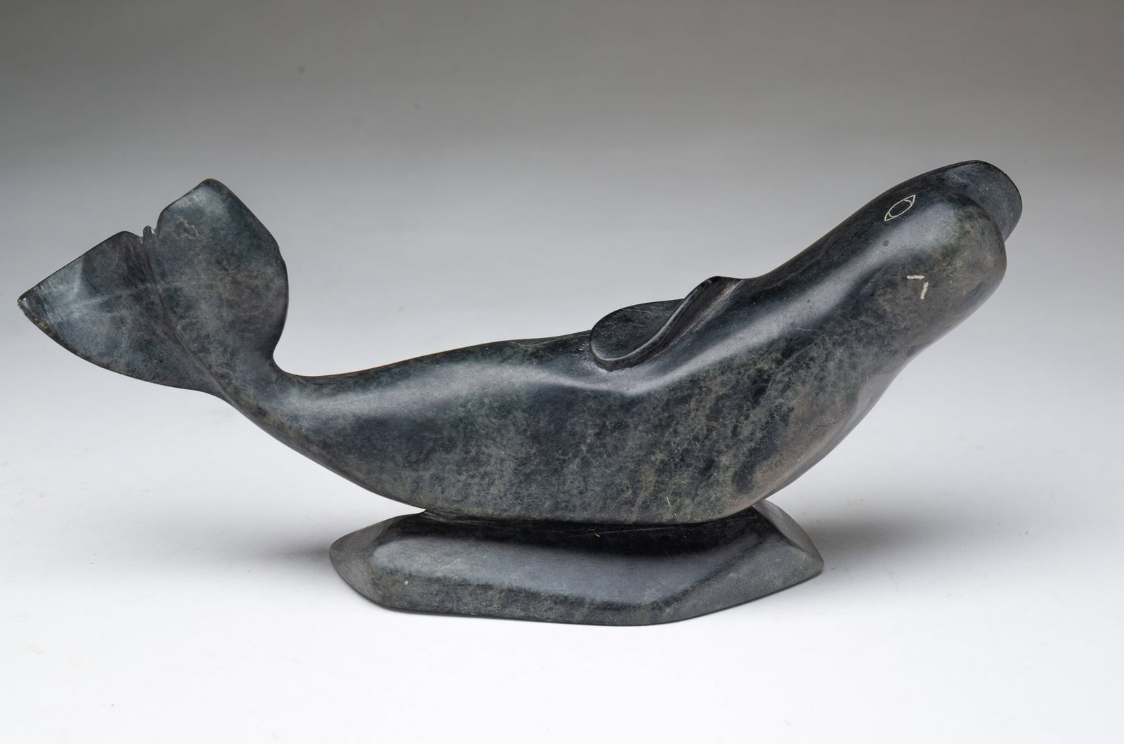 E. PARR (INUIT, 1893-1969) WHALE SOAPSTONE CARVING. (1 of 3)