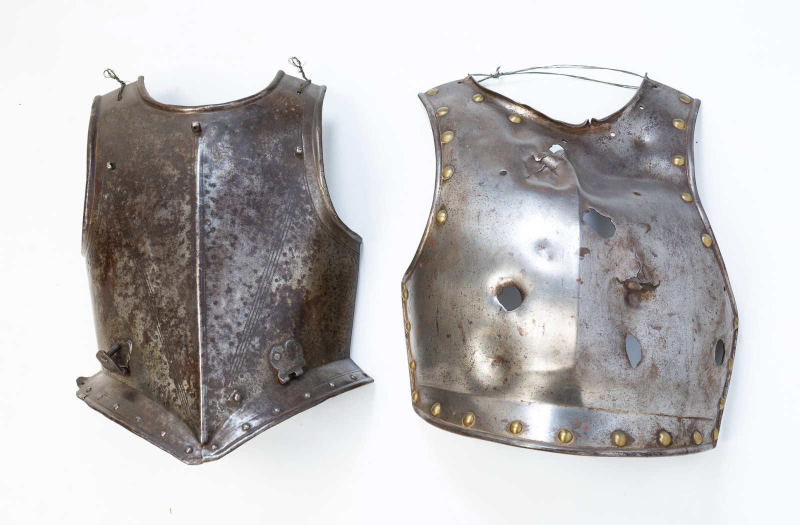 TWO ARMOR BREASTPLATES. (1 of 4)
